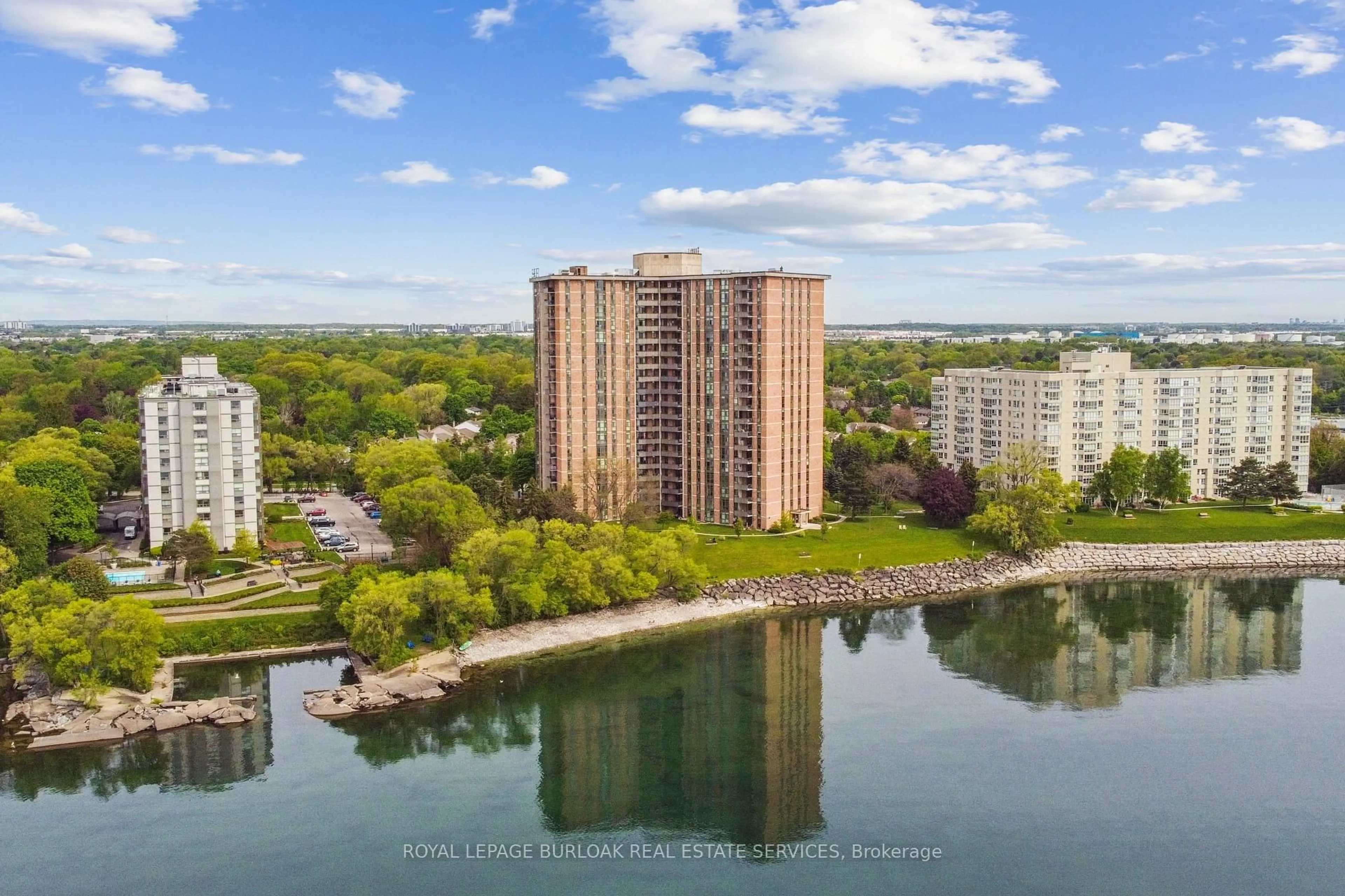A pic from outside/outdoor area/front of a property/back of a property/a pic from drone, water/lake/river/ocean view for 5250 Lakeshore Rd #106, Burlington Ontario L7L 5L2