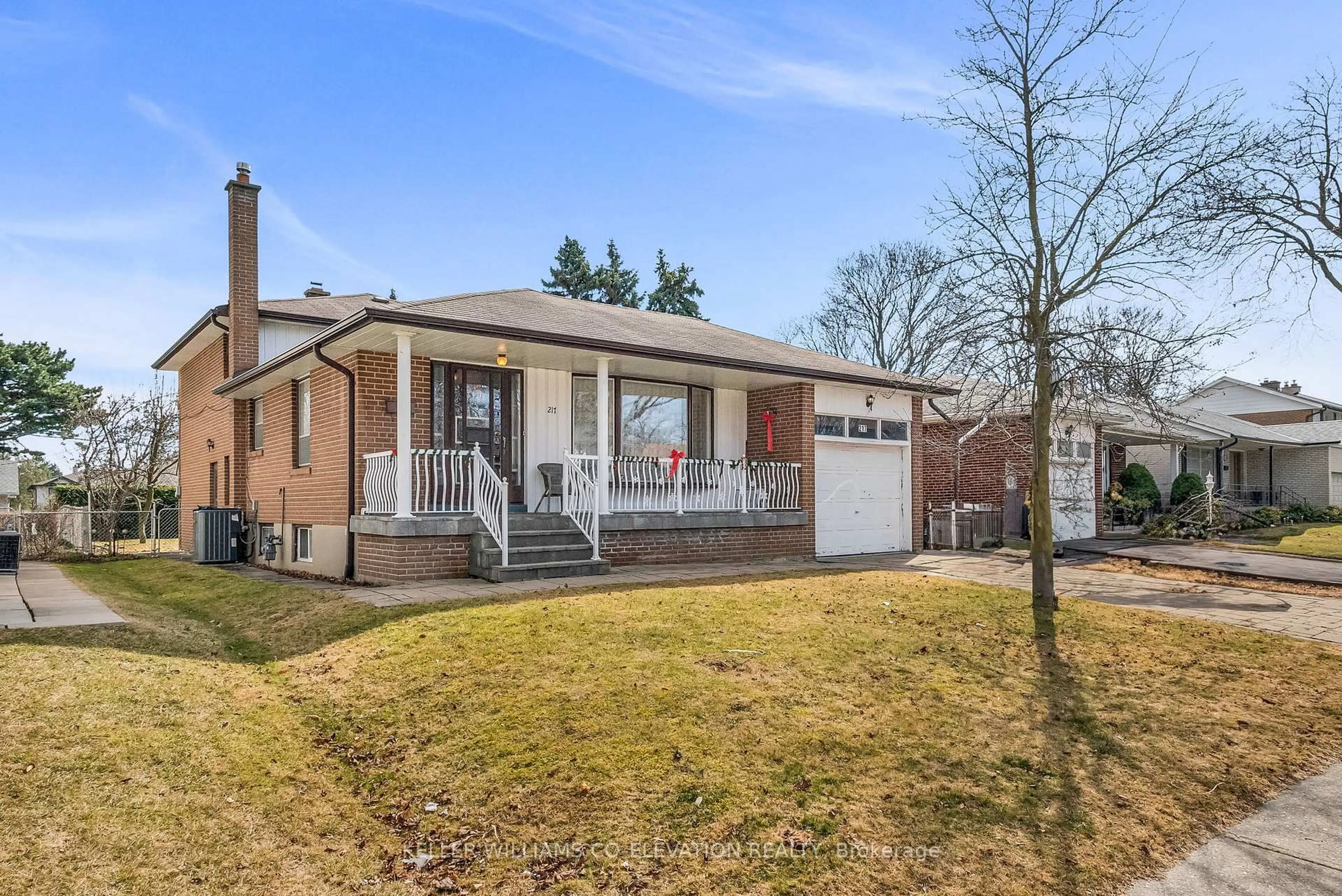 Home with brick exterior material, street for 217 La Rose Ave, Toronto Ontario M9P 1B6
