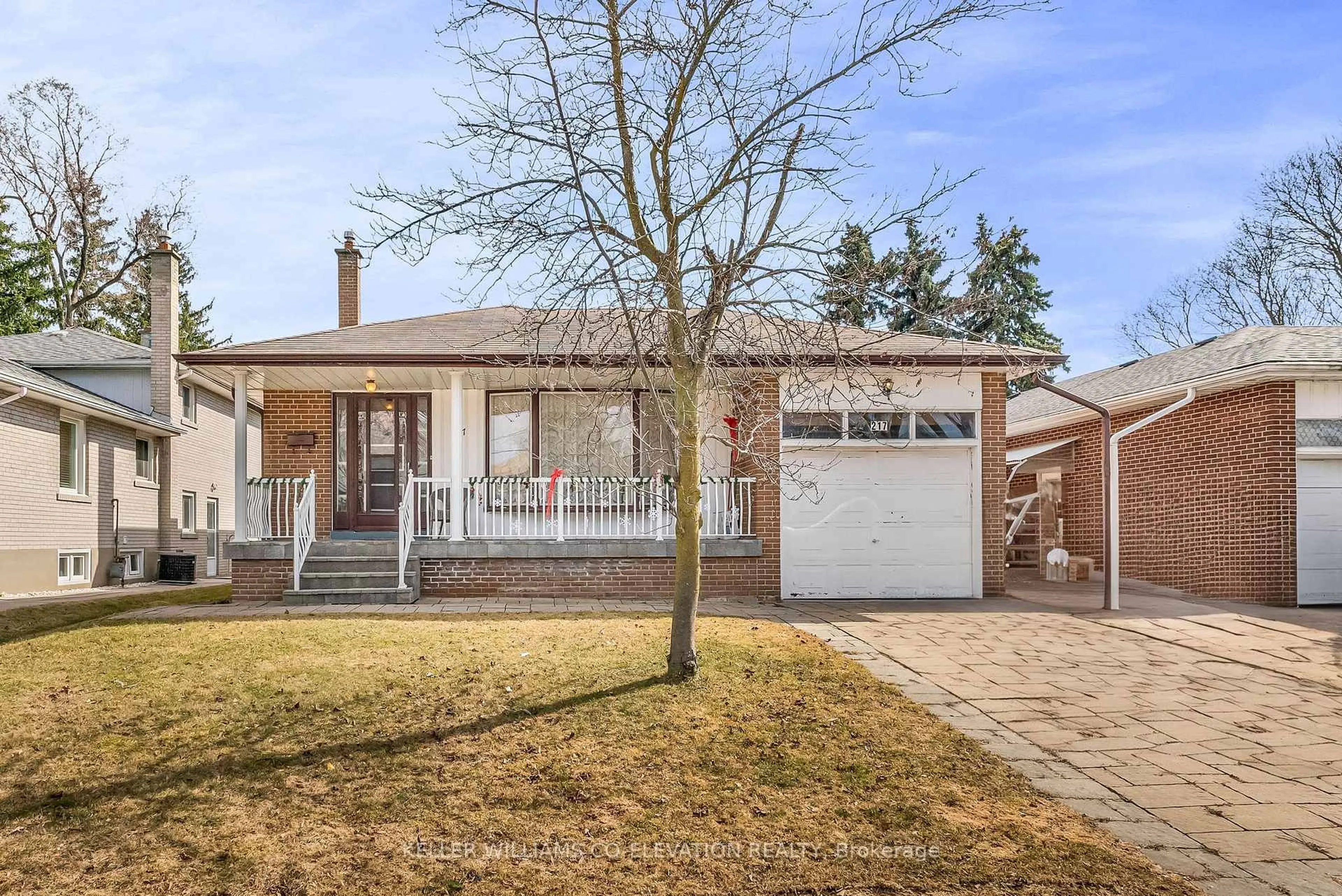 Home with brick exterior material, street for 217 La Rose Ave, Toronto Ontario M9P 1B6