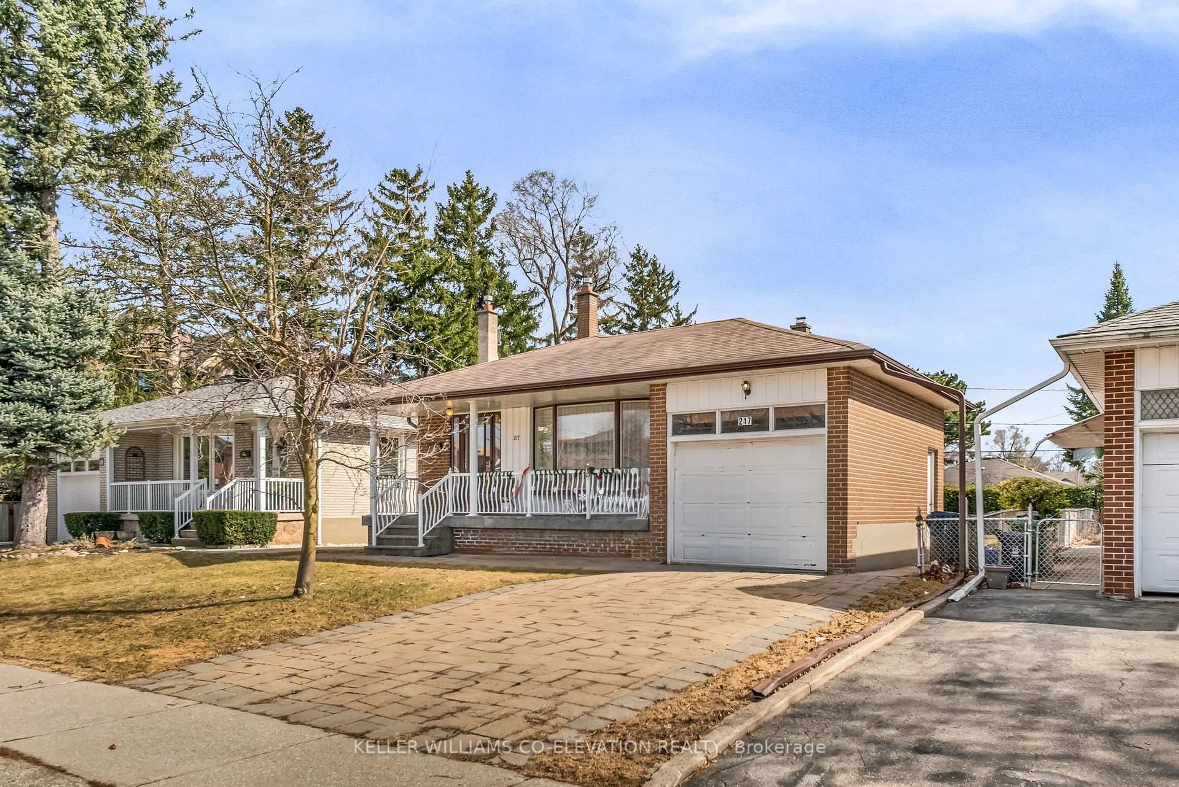 Home with vinyl exterior material, street for 217 La Rose Ave, Toronto Ontario M9P 1B6