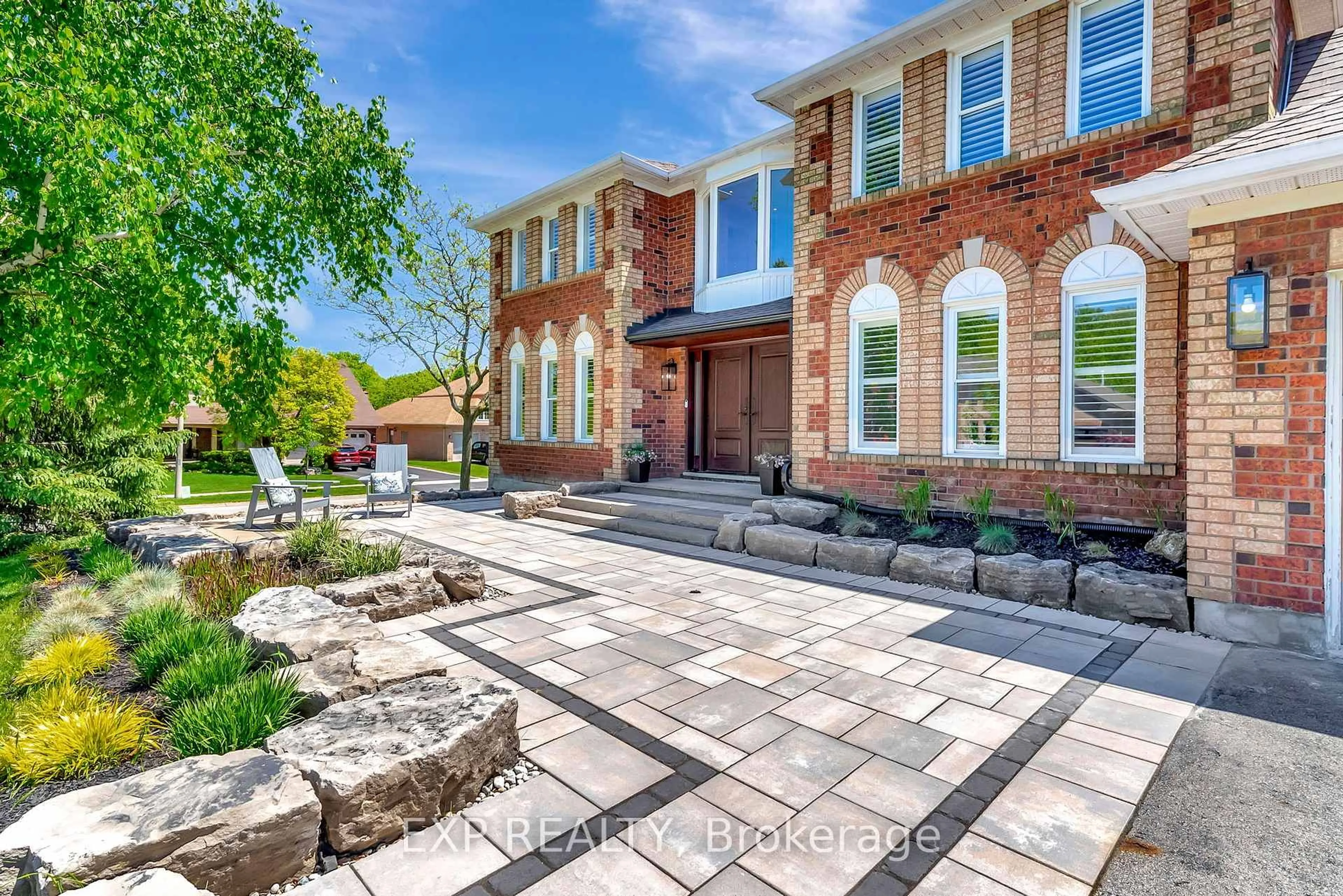 Home with brick exterior material, street for 1399 Winterberry Dr, Burlington Ontario L7P 4T3