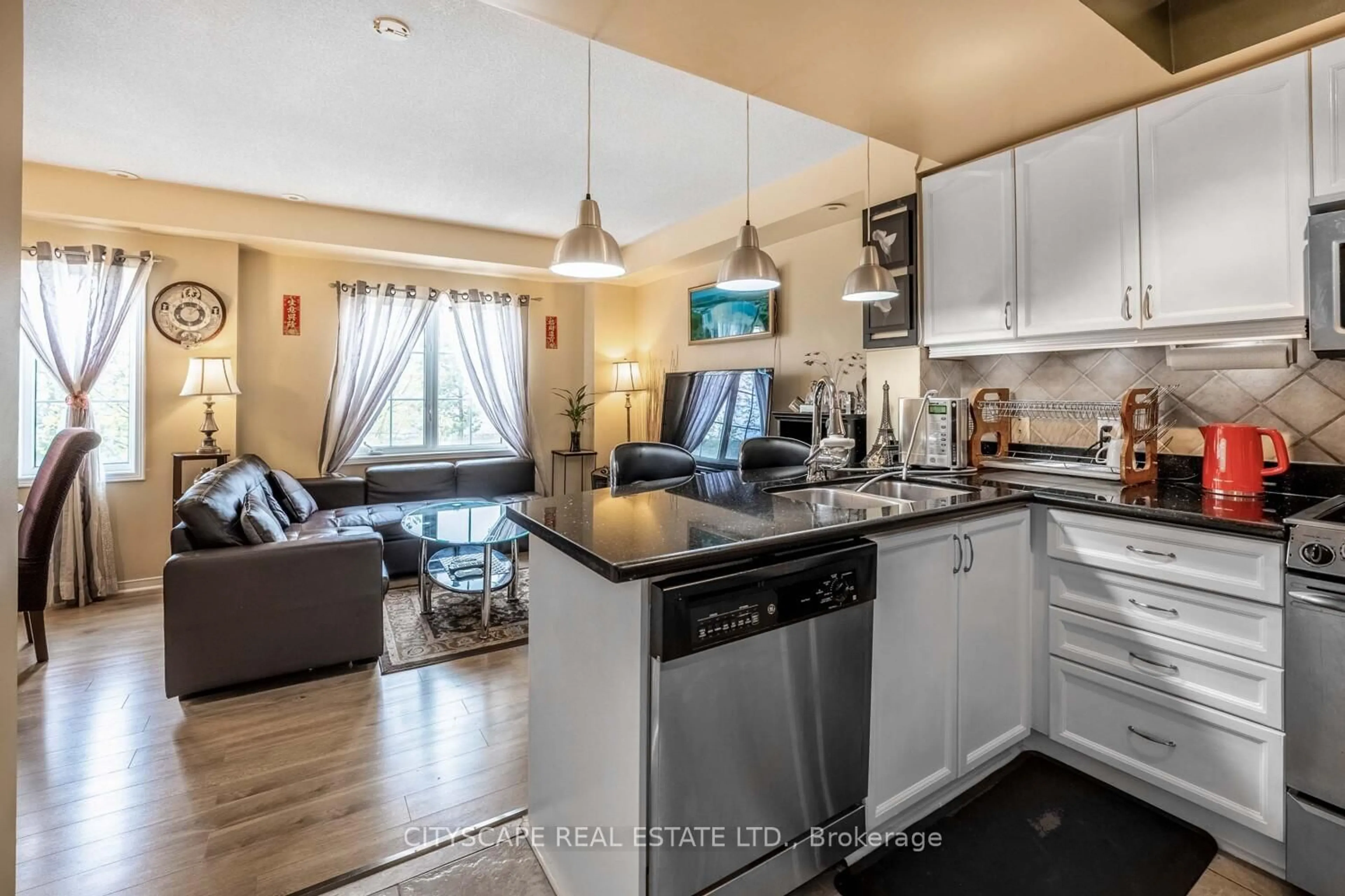 Open concept kitchen, unknown for 3055 Elmcreek Rd #7, Mississauga Ontario L5B 4J9