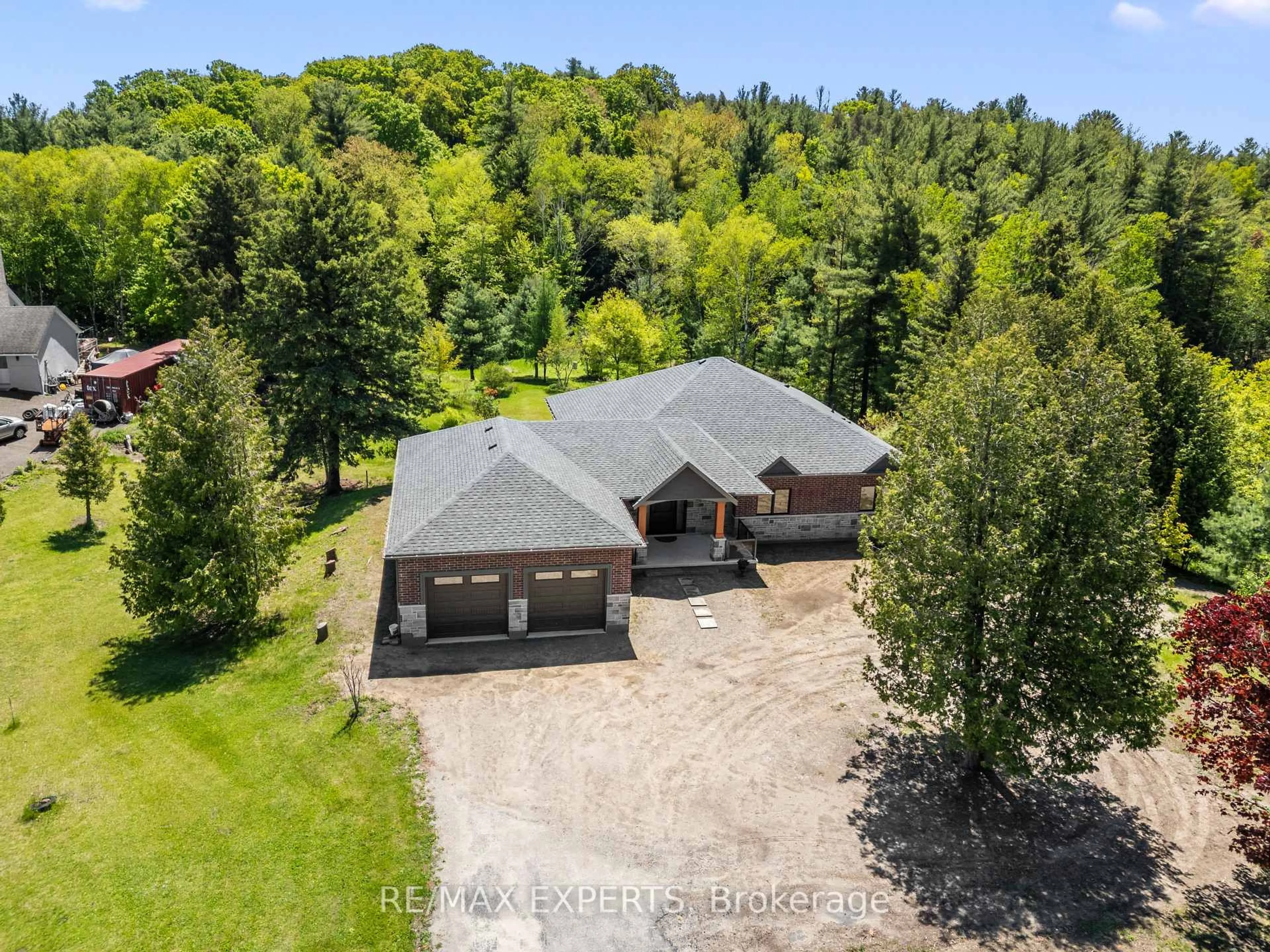 A pic from outside/outdoor area/front of a property/back of a property/a pic from drone, forest/trees view for 211 Pine Ave, Caledon Ontario L7E 3S7