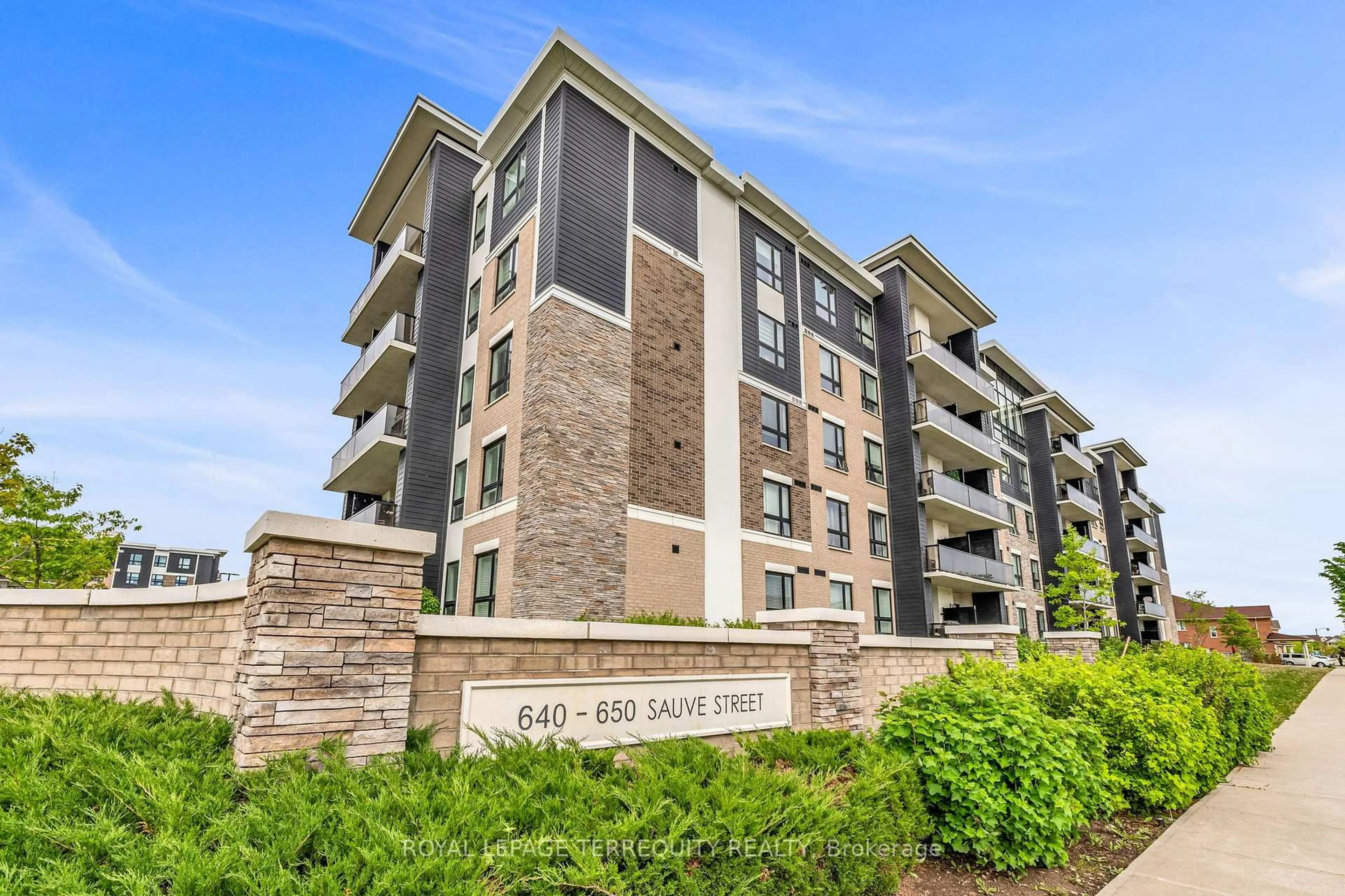 A pic from outside/outdoor area/front of a property/back of a property/a pic from drone, water/lake/river/ocean view for 650 Sauve St #412, Milton Ontario L9T 9A8