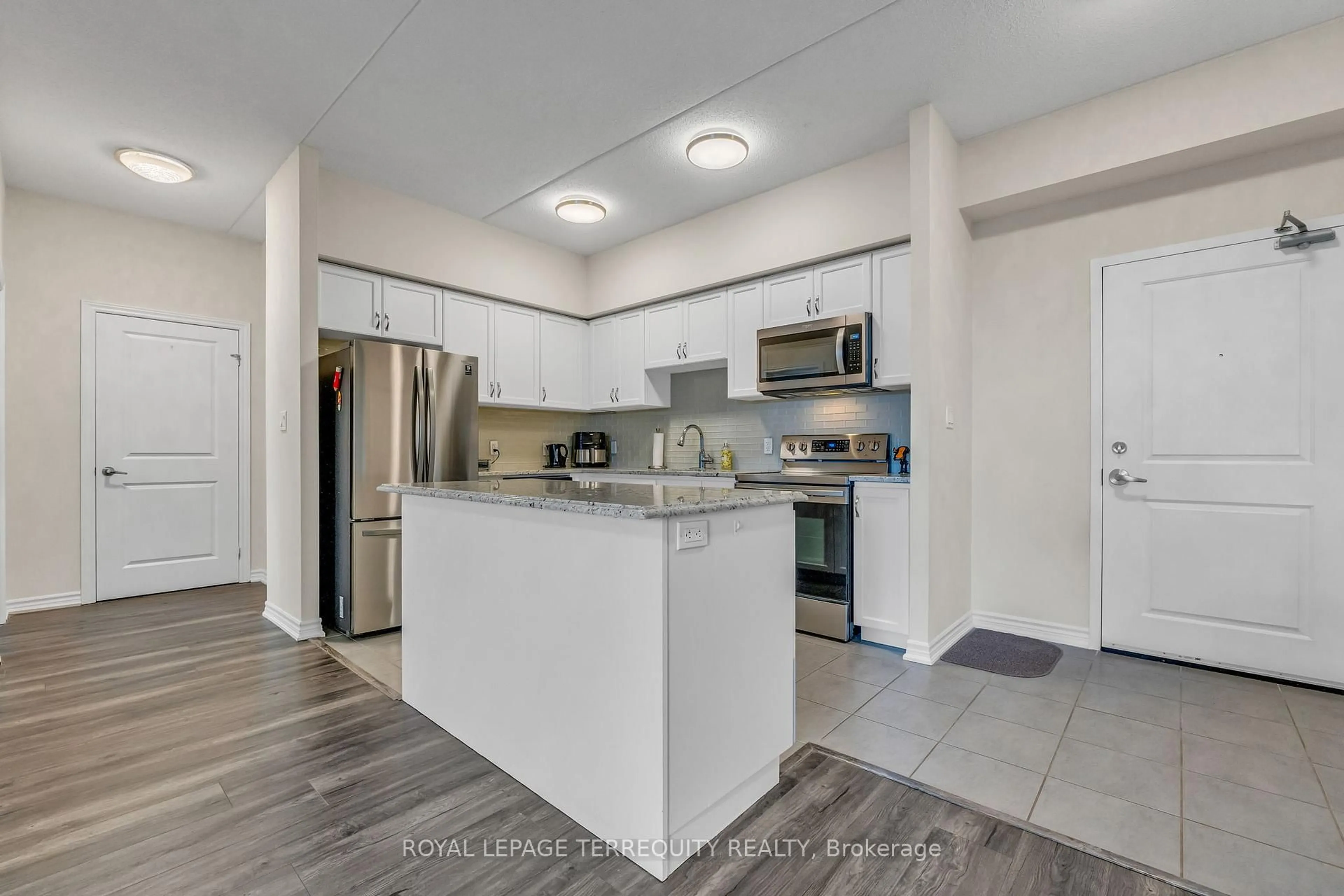 Open concept kitchen, ceramic/tile floor for 650 Sauve St #412, Milton Ontario L9T 9A8
