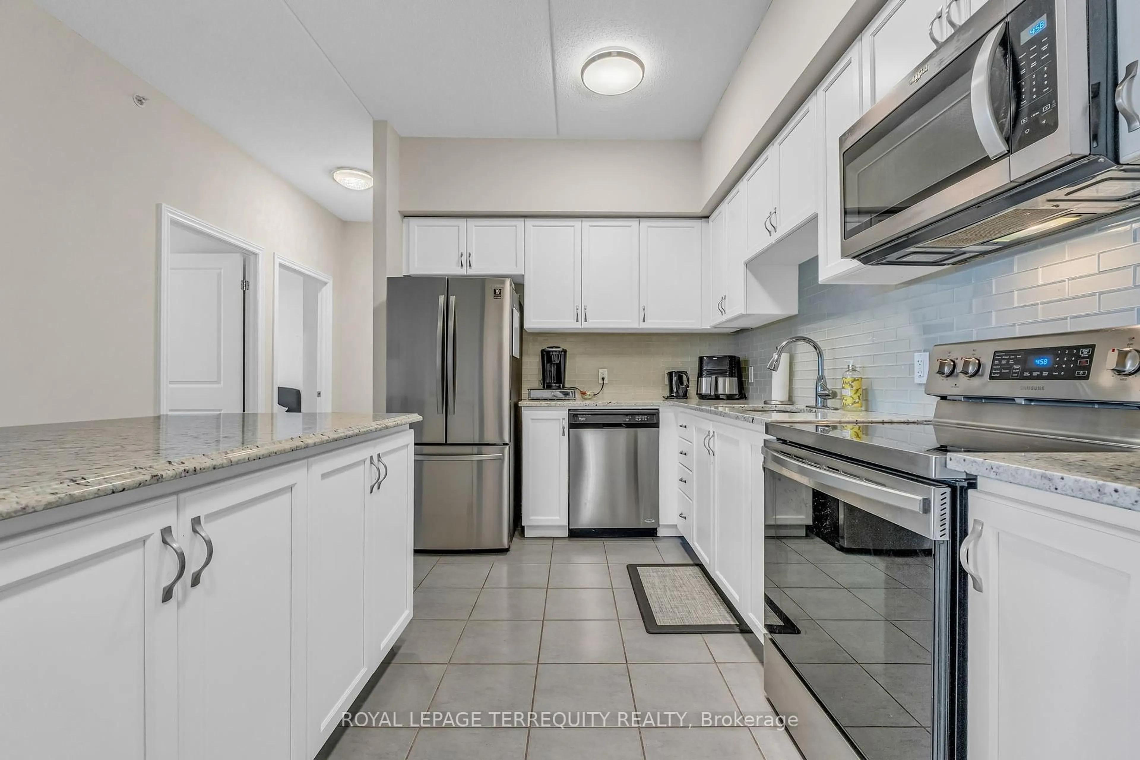 Standard kitchen, ceramic/tile floor for 650 Sauve St #412, Milton Ontario L9T 9A8