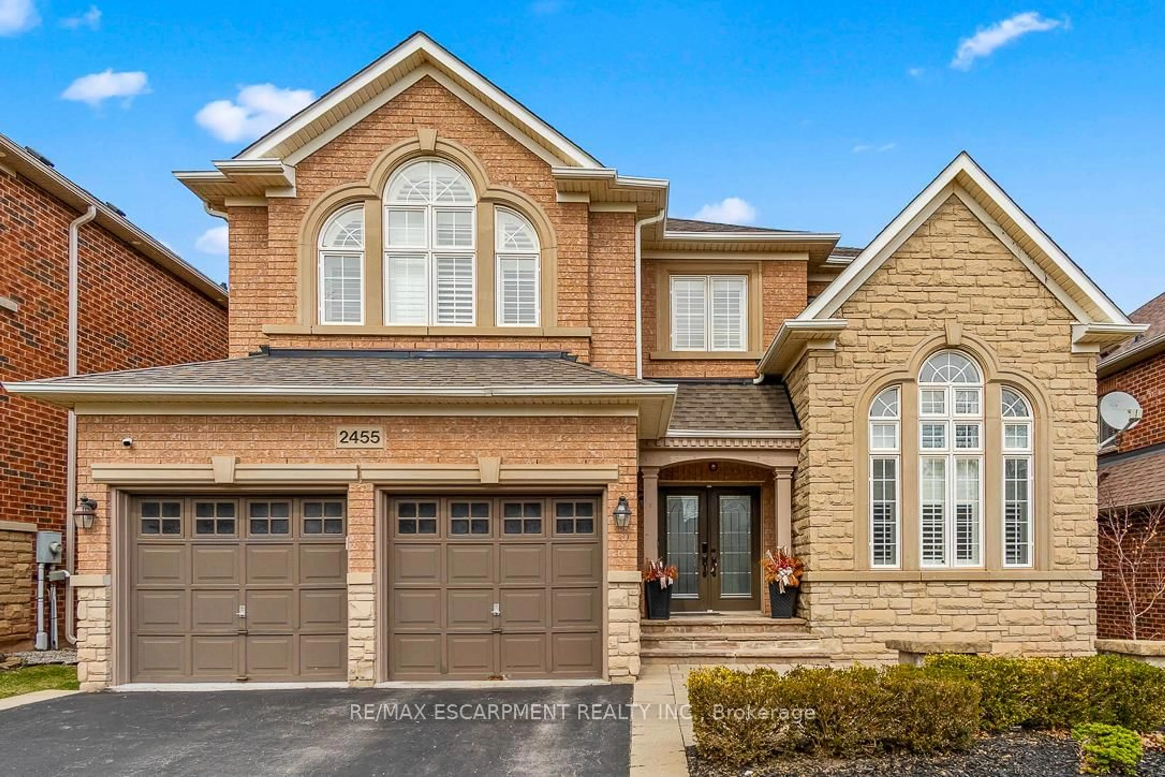 Home with brick exterior material, street for 2455 BON ECHO Dr, Oakville Ontario L6H 7R1