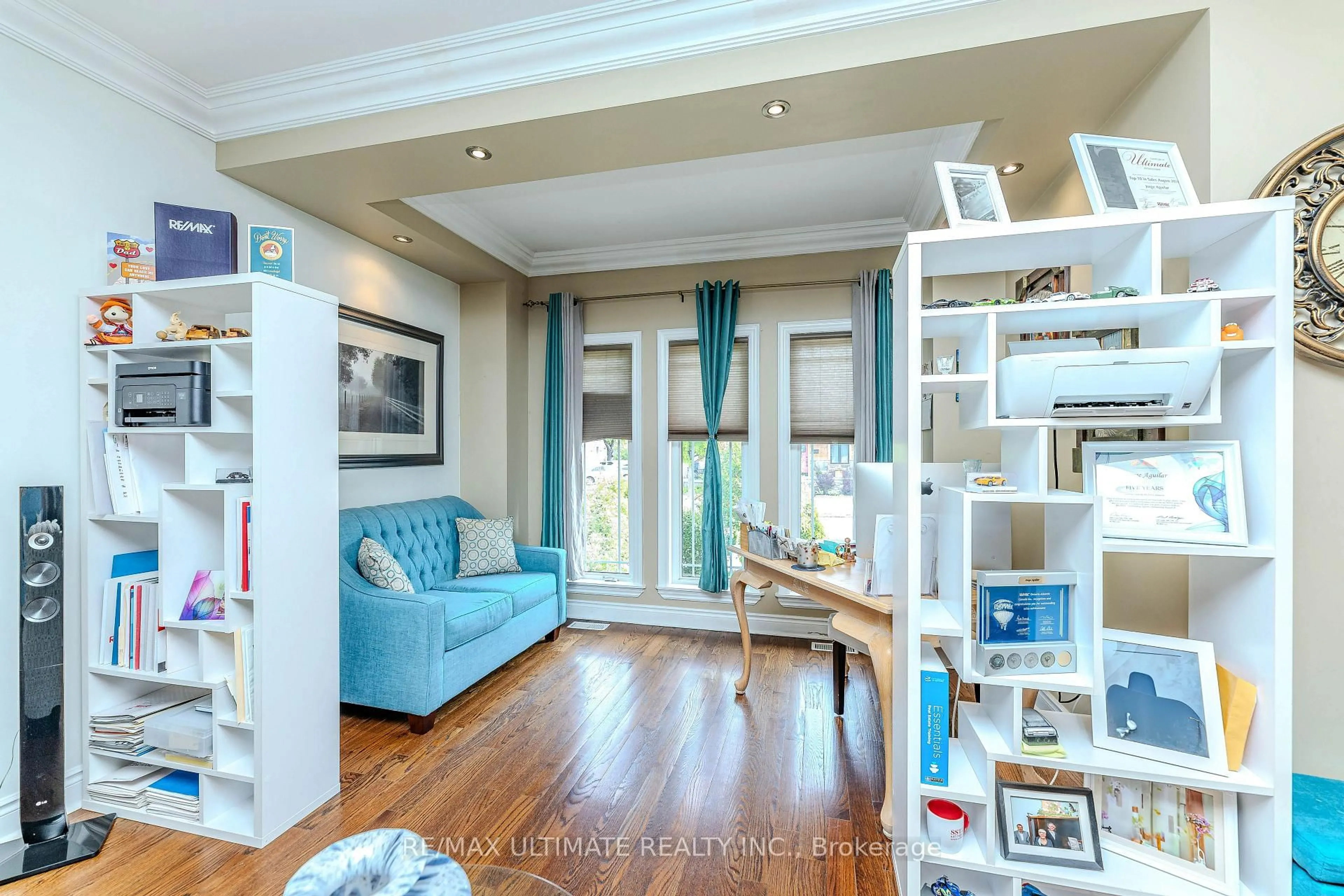 Living room with furniture, wood/laminate floor for 134 Brownville Ave, Toronto Ontario M6N 4L4