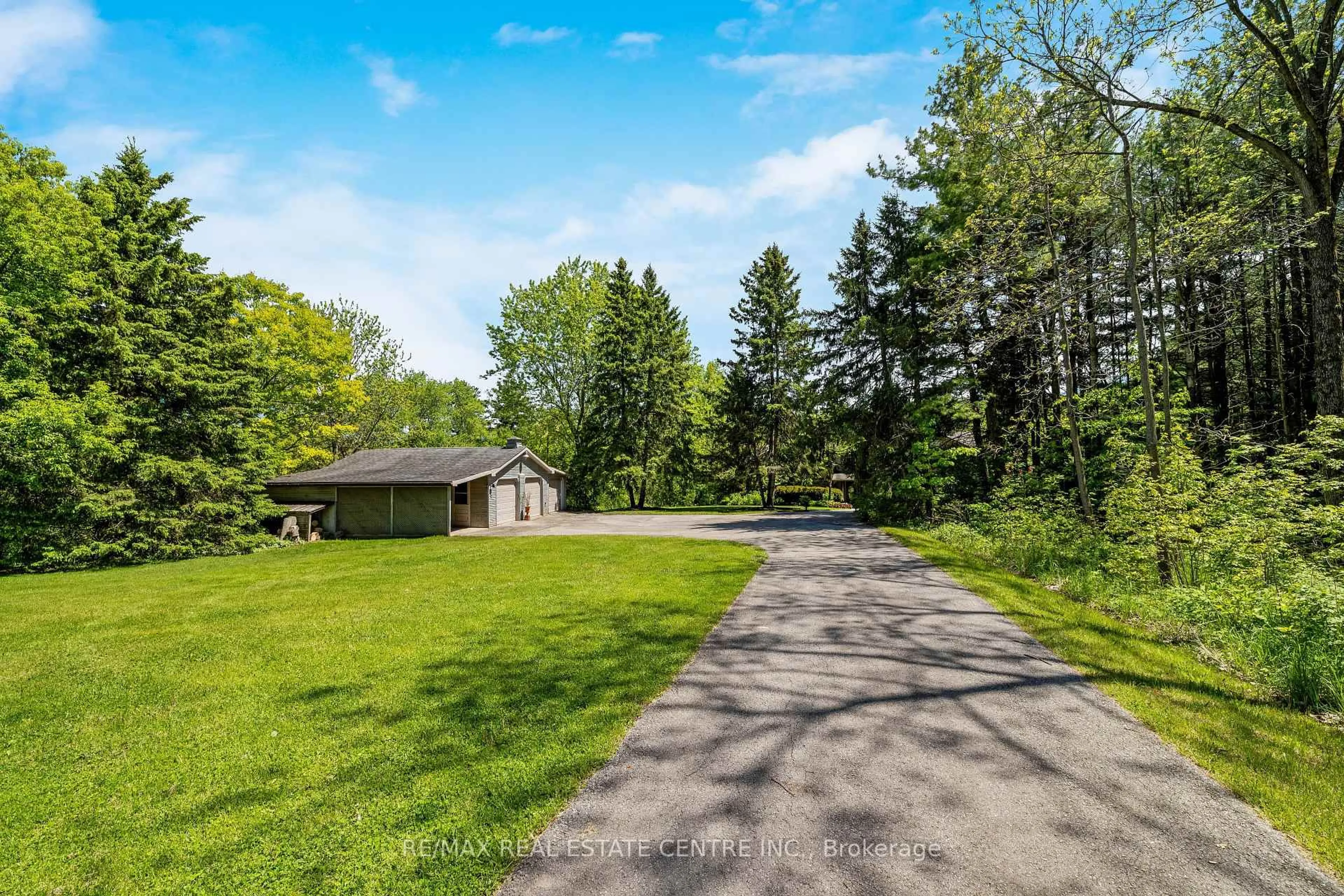 A pic from outside/outdoor area/front of a property/back of a property/a pic from drone, unknown for 8492 Canyon Rd, Milton Ontario L0P 1B0