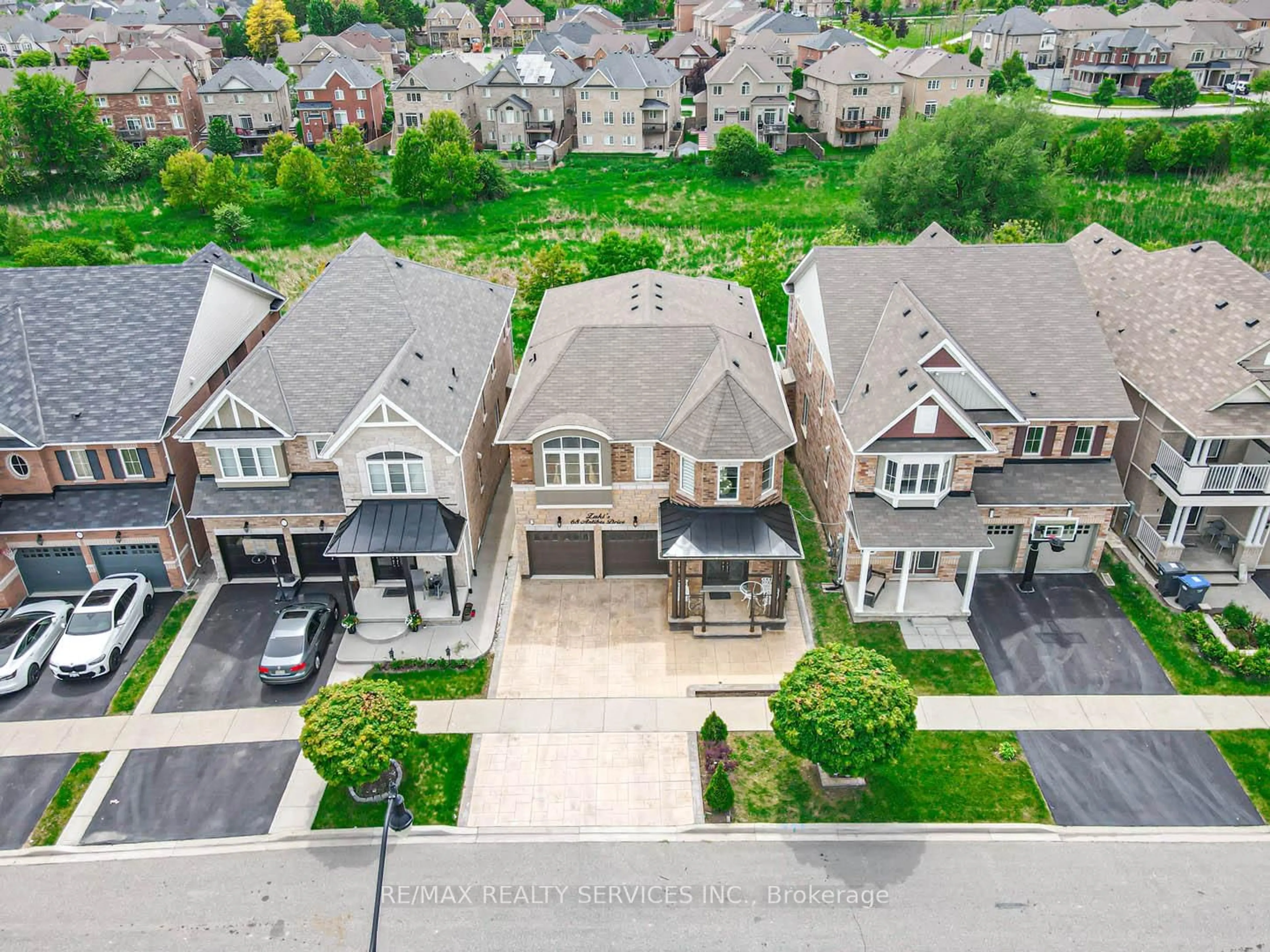 A pic from outside/outdoor area/front of a property/back of a property/a pic from drone, street for 68 Antibes Dr, Brampton Ontario L6X 5H5