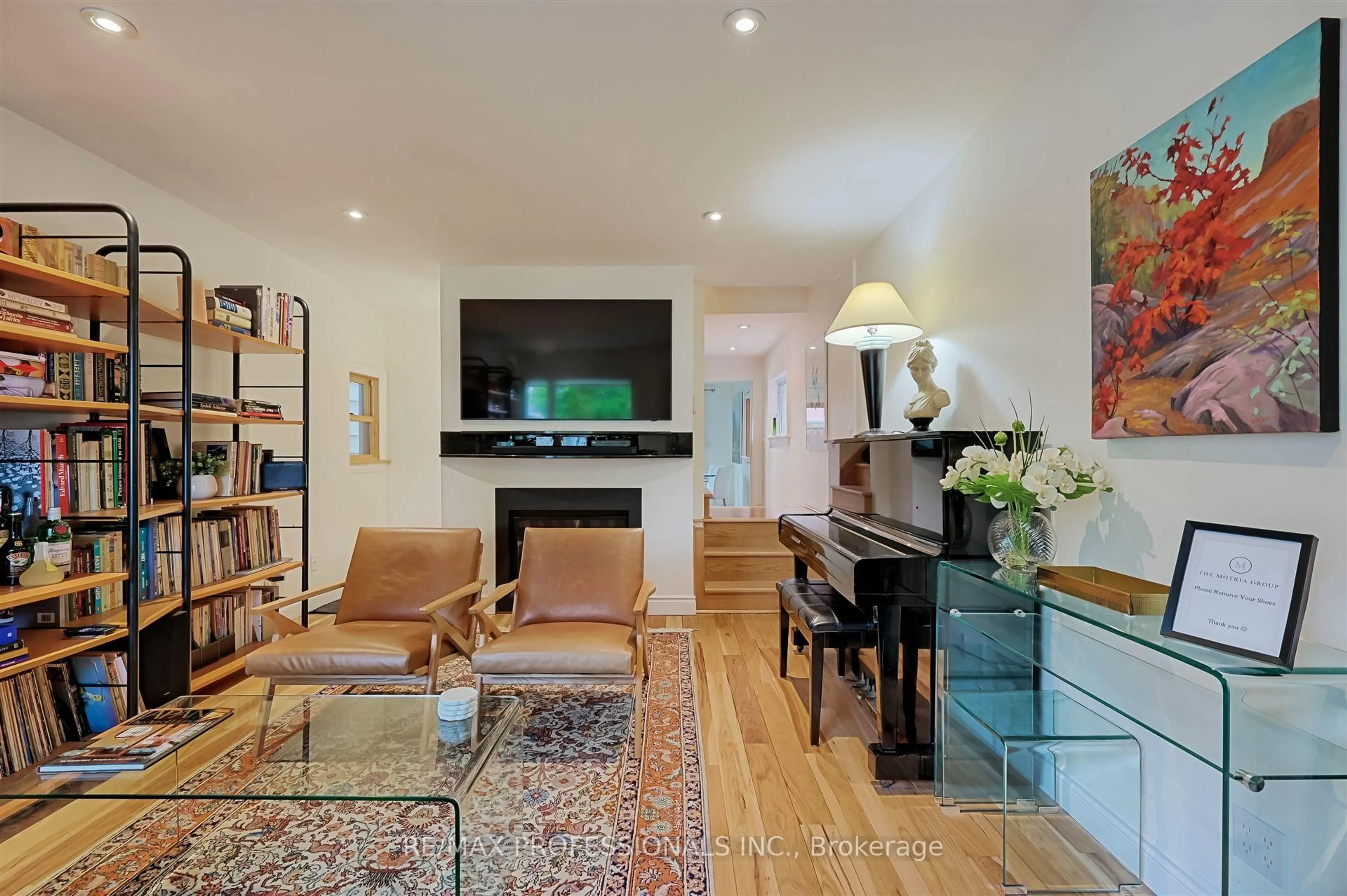 Living room with furniture, wood/laminate floor for 36 Florence Cres, Toronto Ontario M6N 4E5