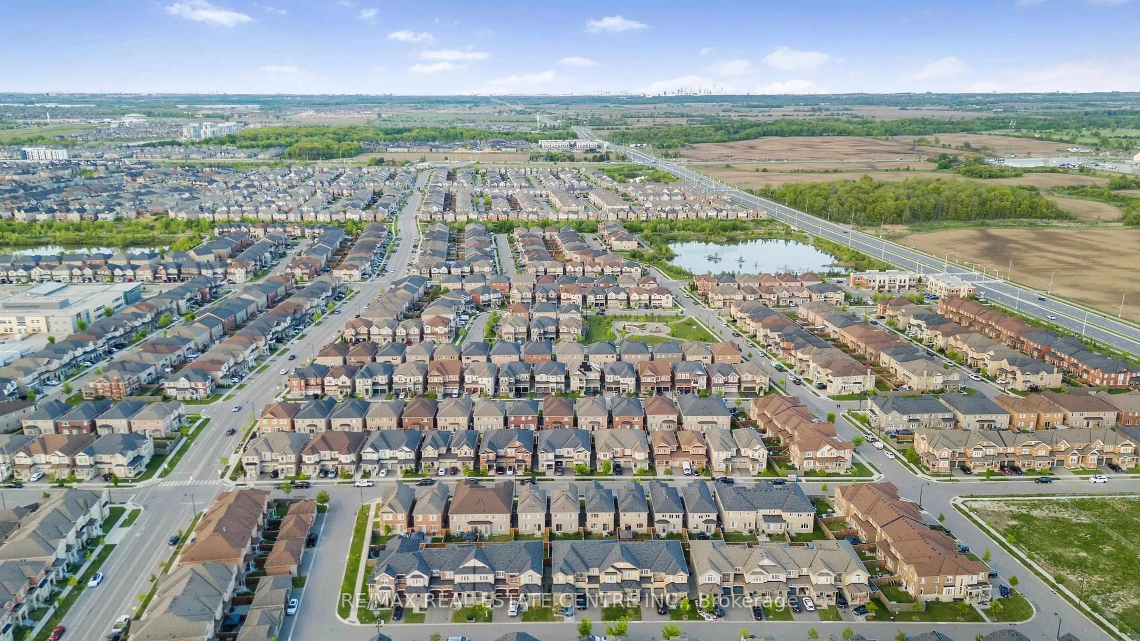 A pic from outside/outdoor area/front of a property/back of a property/a pic from drone, street for 1525 Carr Landing N/A, Milton Ontario L9E 1H2