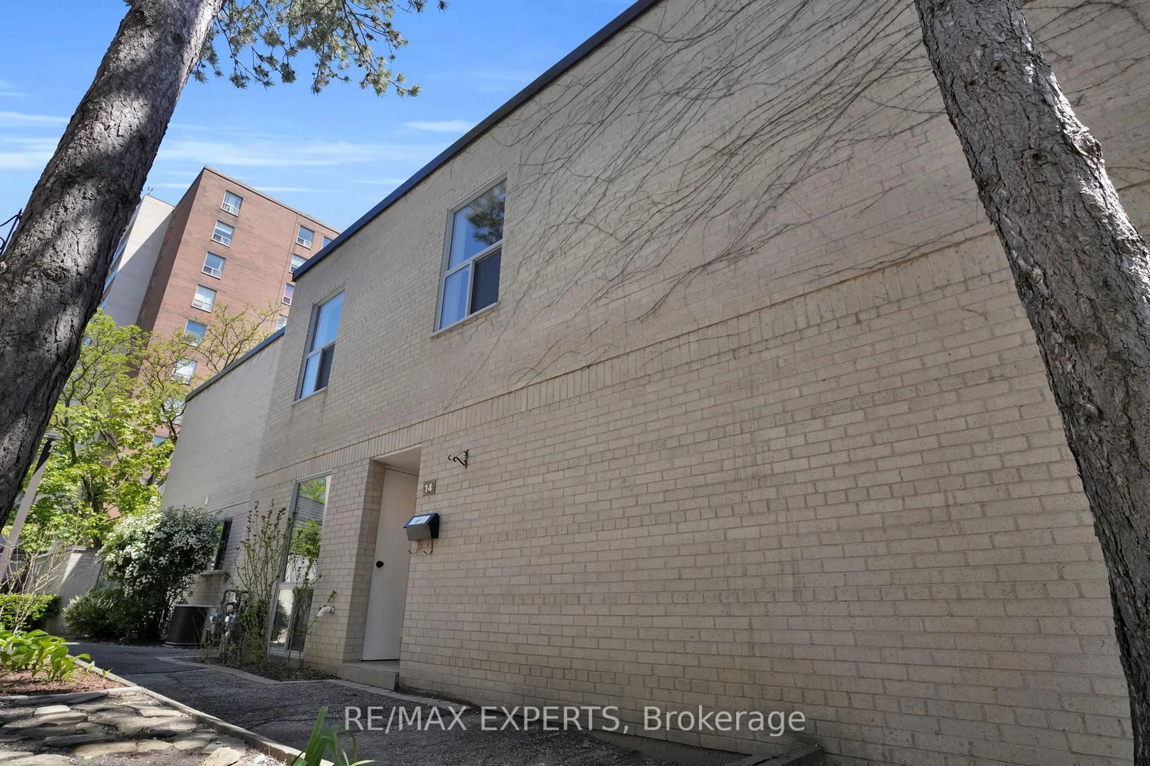 Home with brick exterior material, street for 7 Four Winds Dr #14, Toronto Ontario M3J 1K7