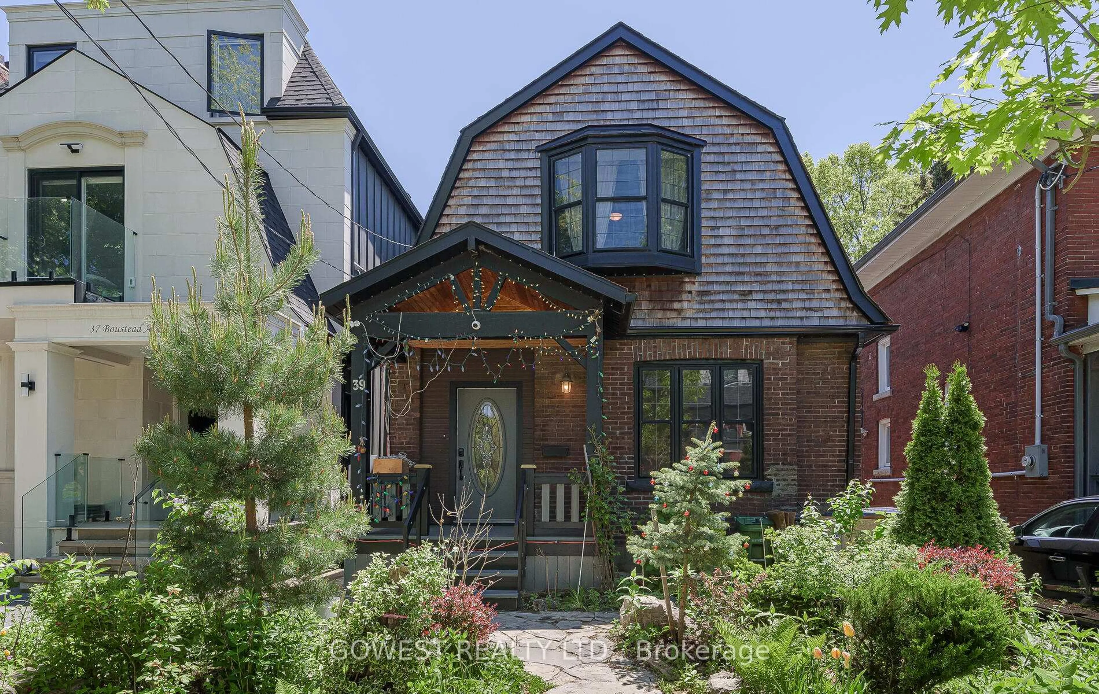 Home with brick exterior material, street for 39 Boustead Ave, Toronto Ontario M6R 1Y7