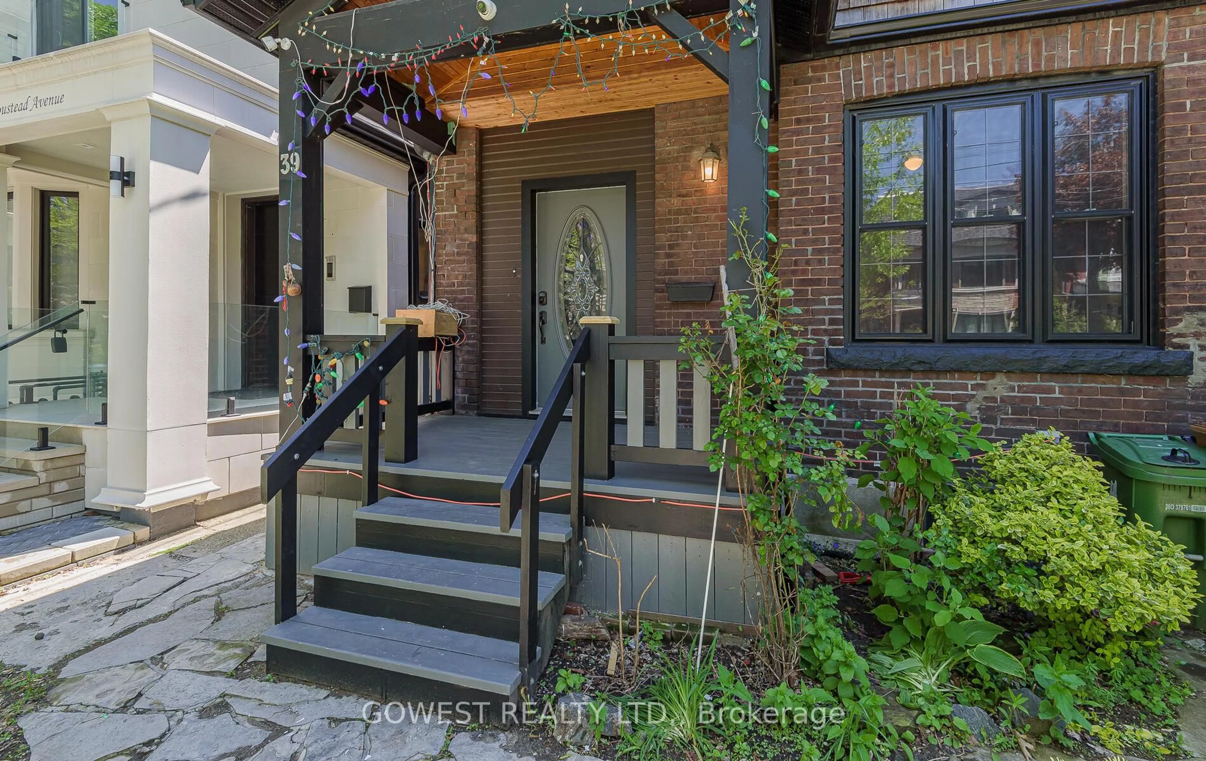 Home with brick exterior material, street for 39 Boustead Ave, Toronto Ontario M6R 1Y7