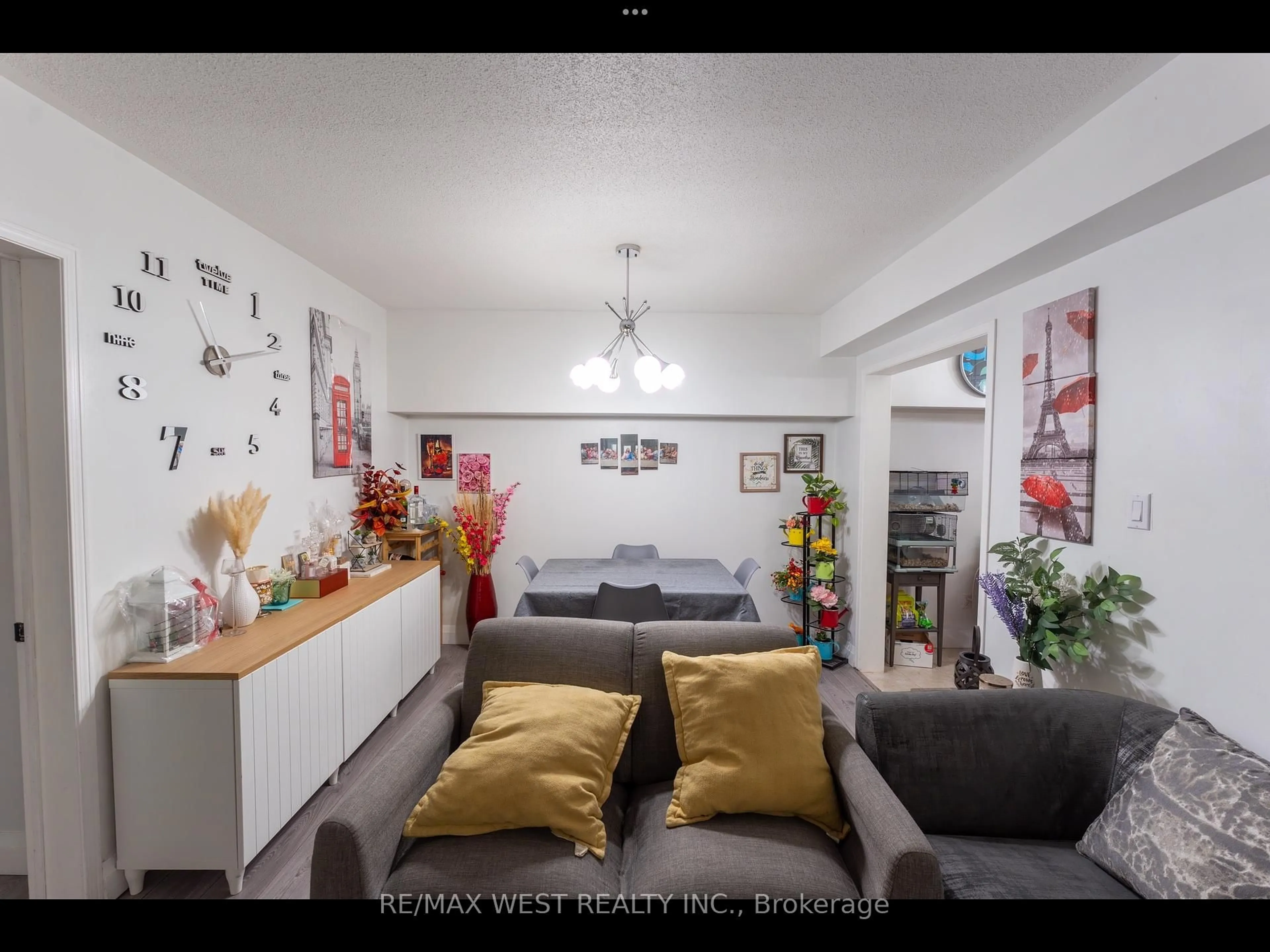 Living room with furniture, unknown for 52 Sidney Belsey Cres #104, Toronto Ontario M6M 5J1