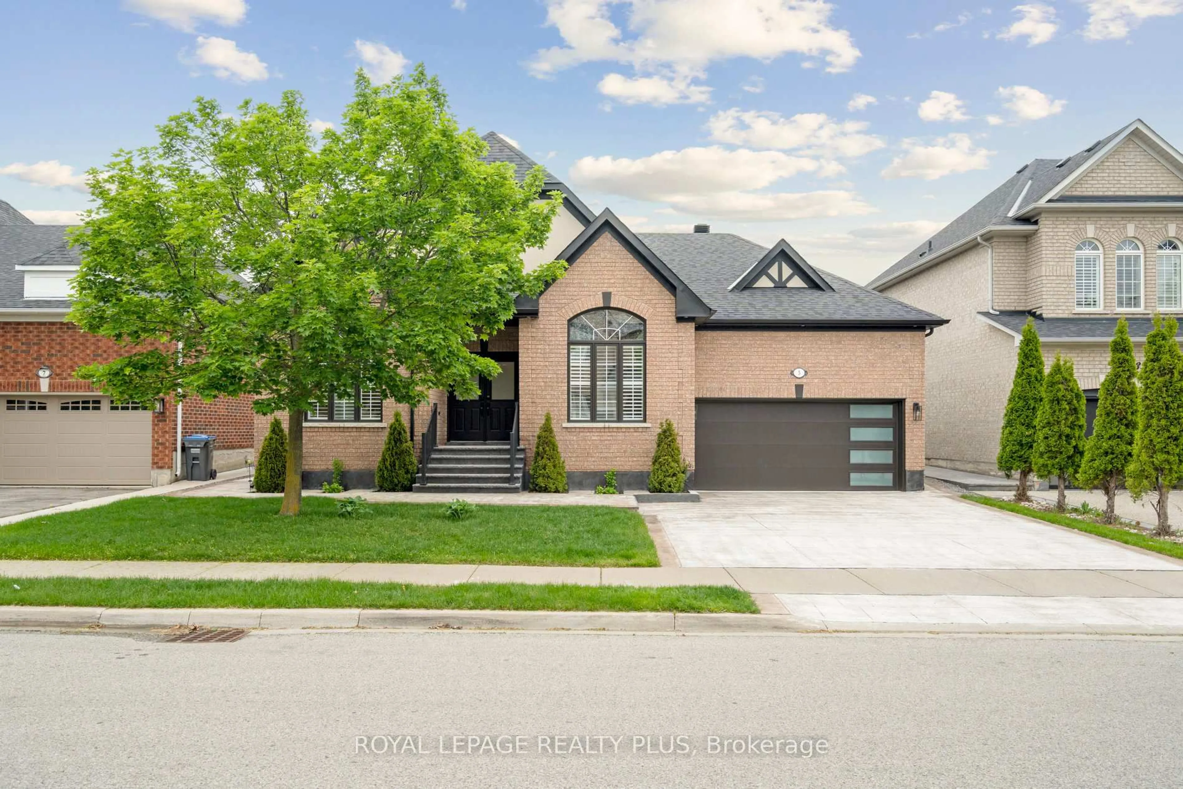 Home with brick exterior material, street for 5 Redearth Gate, Brampton Ontario L6P 2L5