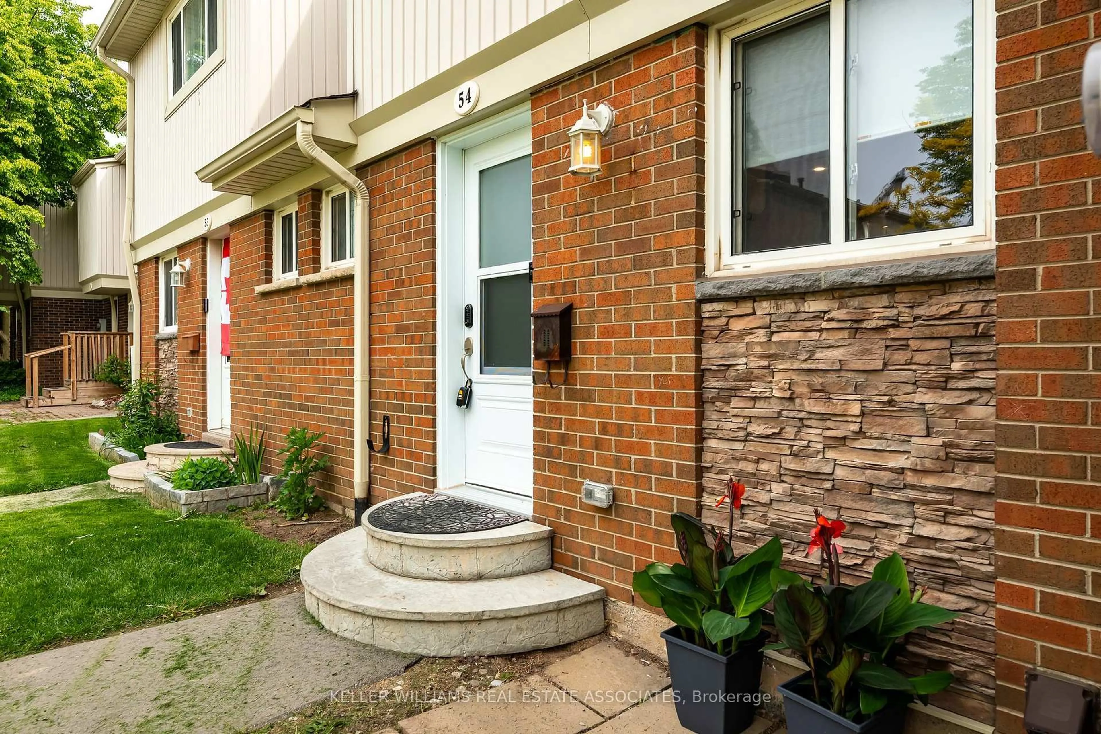 Home with brick exterior material, street for 561 Childs Dr #54, Milton Ontario L9T 3Z1