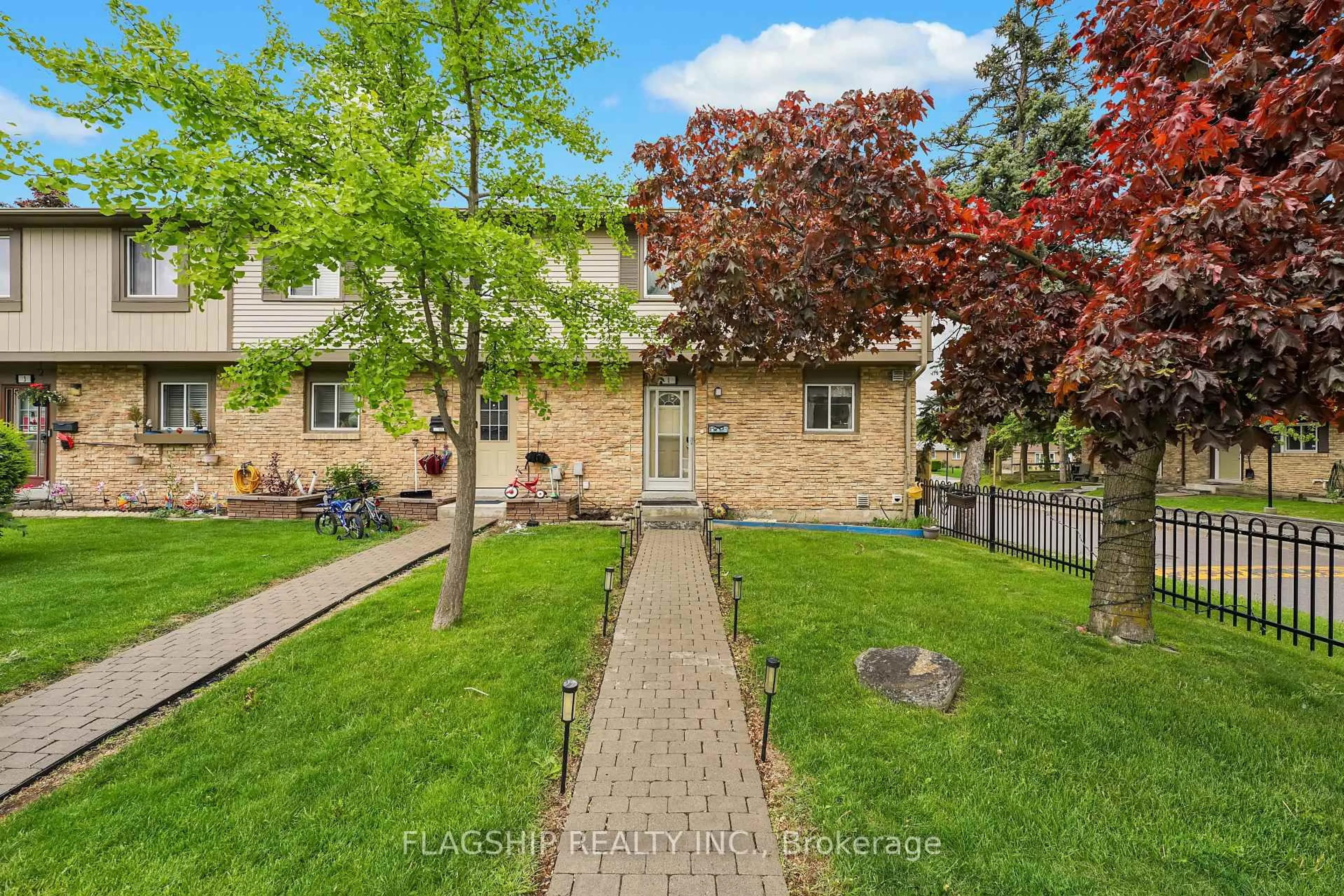 A pic from outside/outdoor area/front of a property/back of a property/a pic from drone, street for 57 Hansen Rd #1, Brampton Ontario L6V 3C6