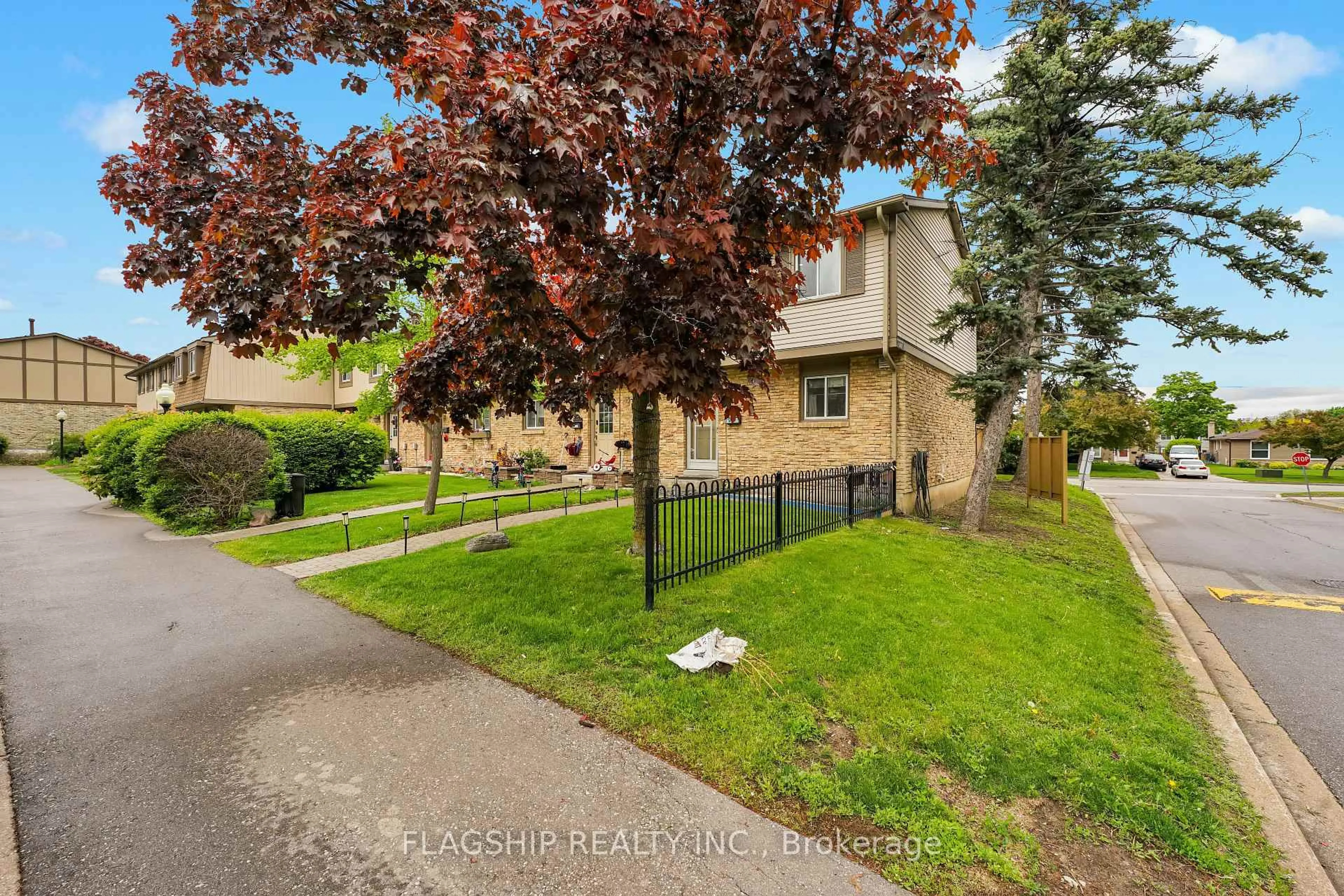 A pic from outside/outdoor area/front of a property/back of a property/a pic from drone, street for 57 Hansen Rd #1, Brampton Ontario L6V 3C6