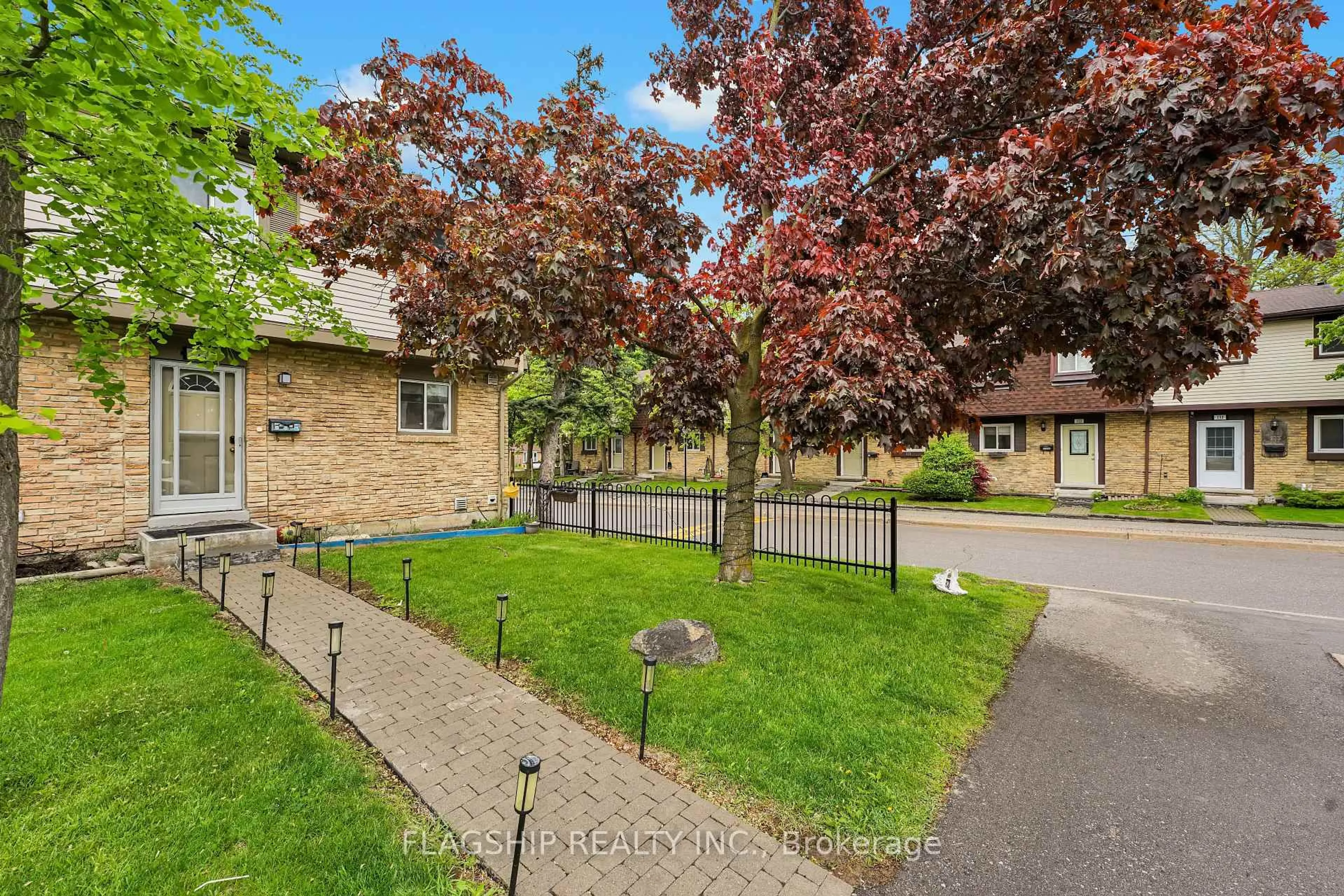A pic from outside/outdoor area/front of a property/back of a property/a pic from drone, street for 57 Hansen Rd #1, Brampton Ontario L6V 3C6