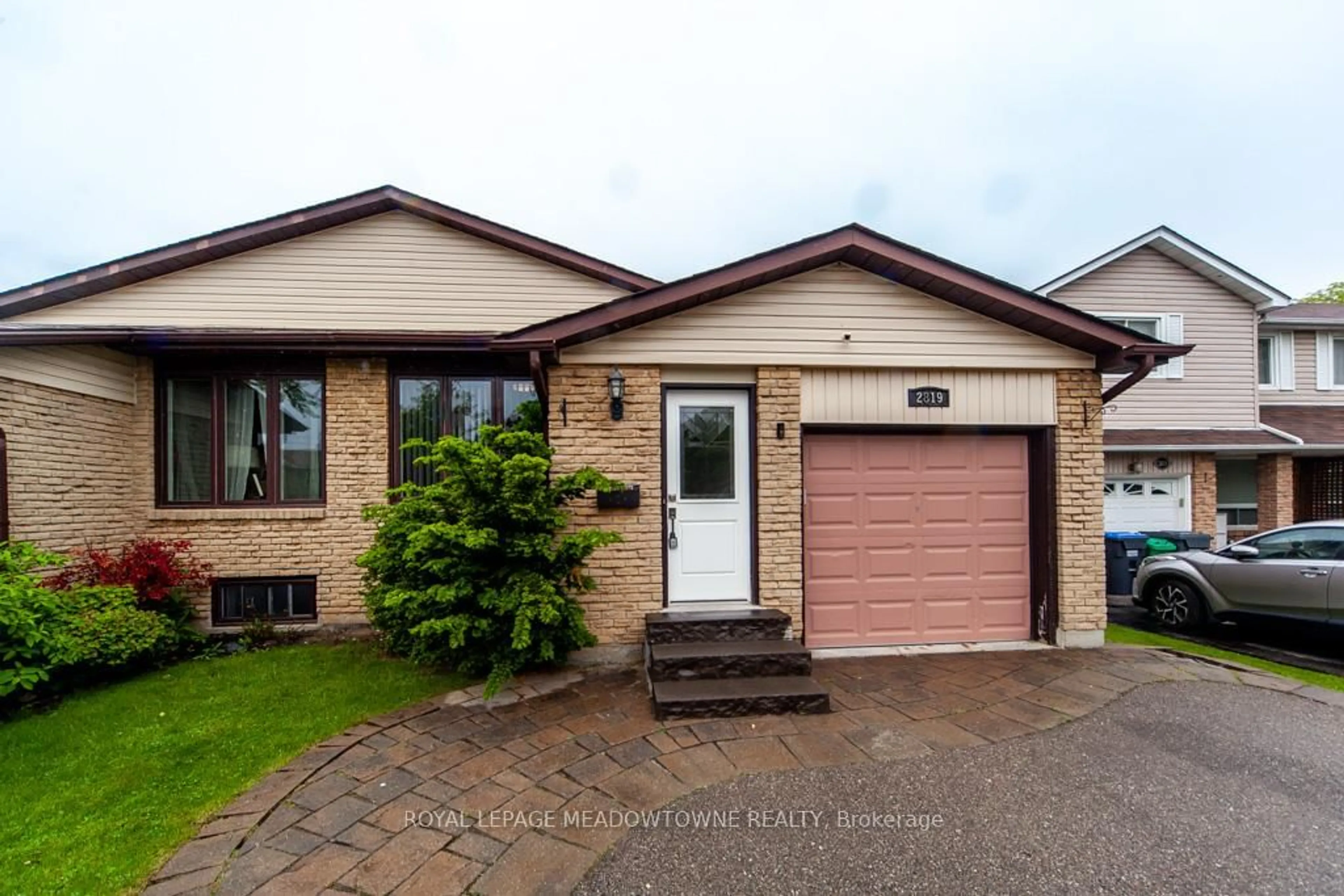 Home with brick exterior material, street for 2819 Bucklepost Rd, Mississauga Ontario L5N 1X6