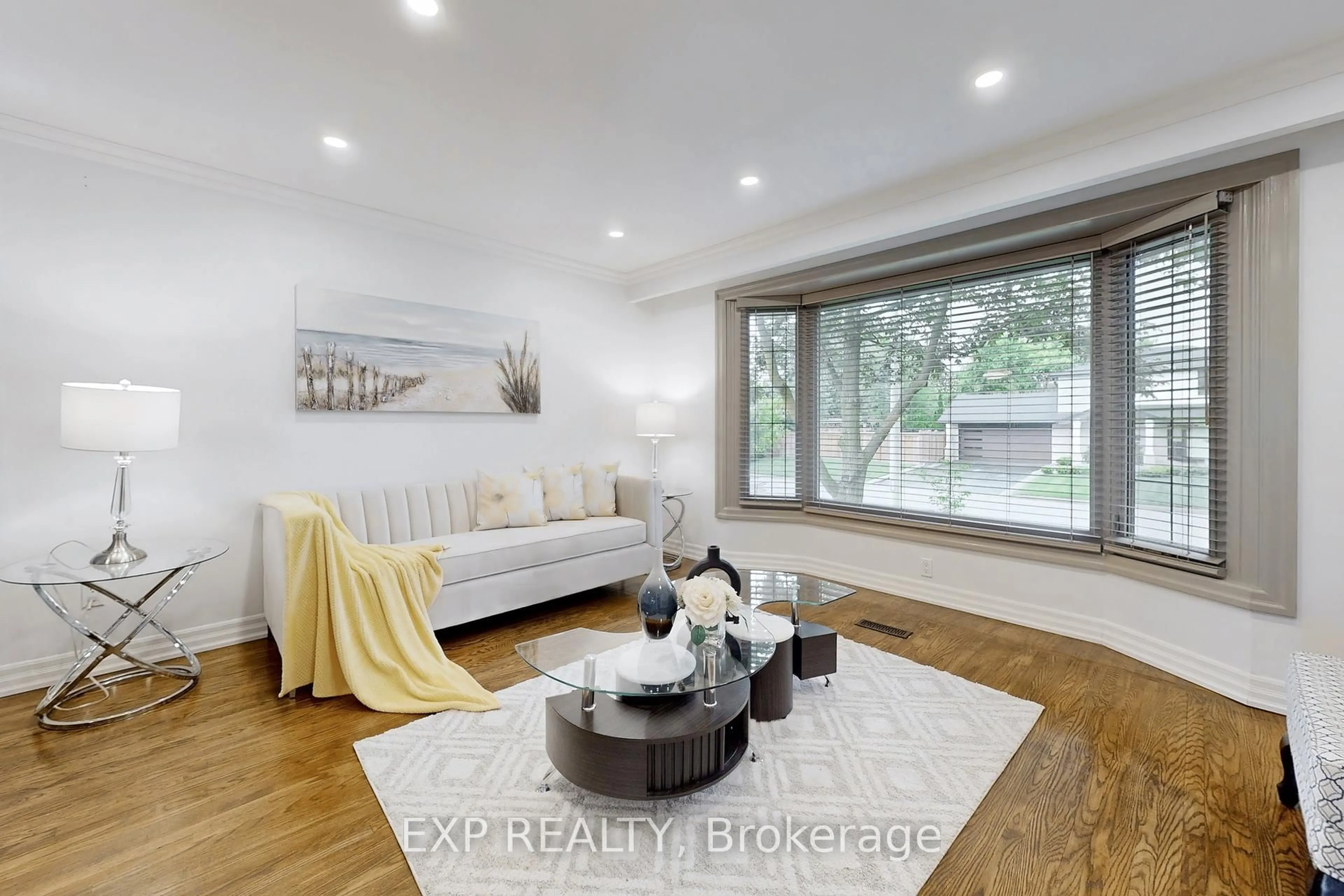Living room with furniture, wood/laminate floor for 5 Lockton Cres, Brampton Ontario L6W 1C2