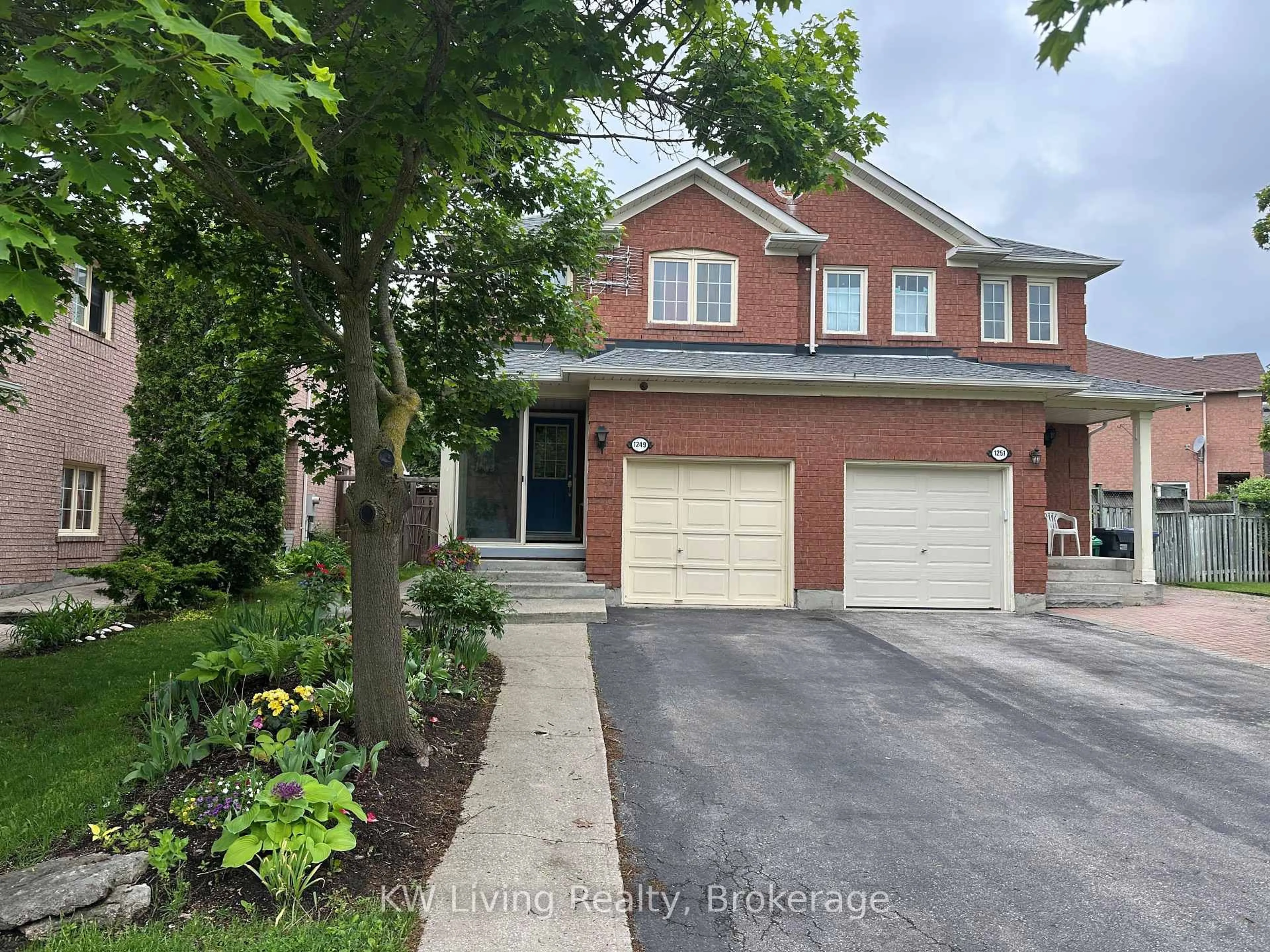 Home with brick exterior material, street for 1249 Quest Circ, Mississauga Ontario L5N 8B6