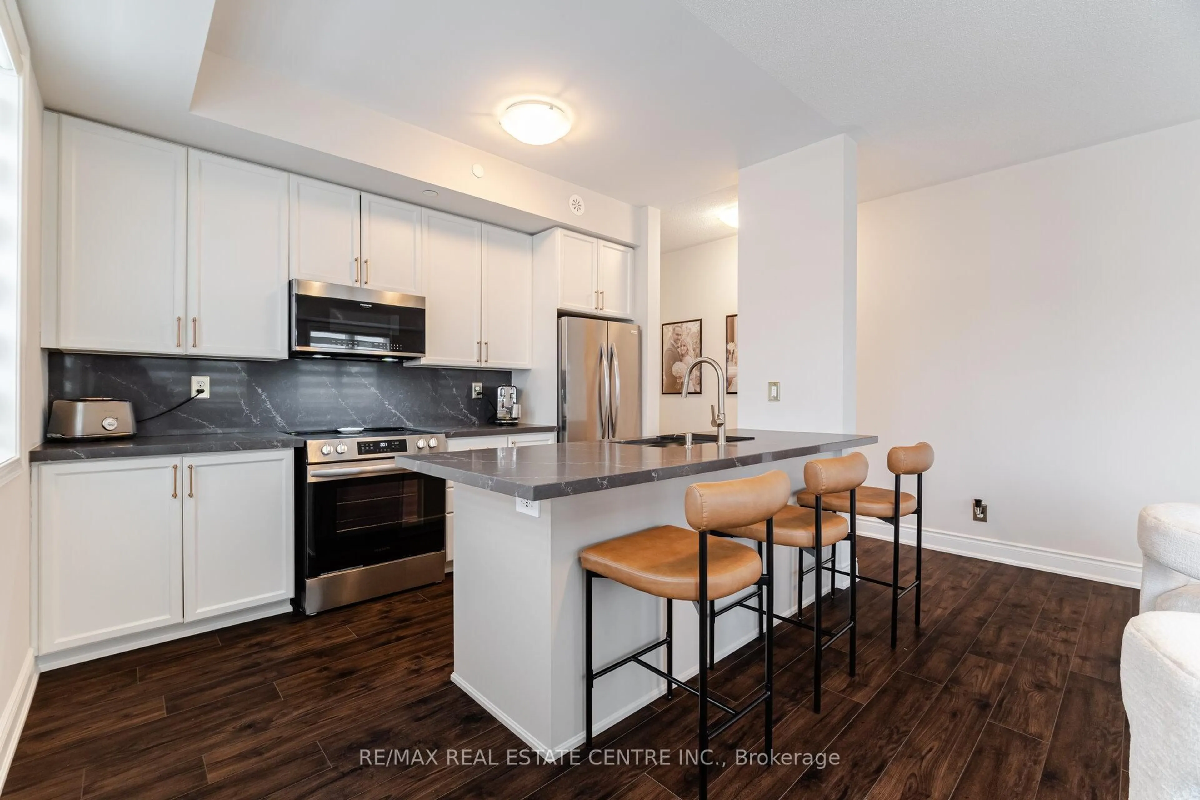 Open concept kitchen, unknown for 5705 Long Valley Rd #305, Mississauga Ontario L5M 0M3