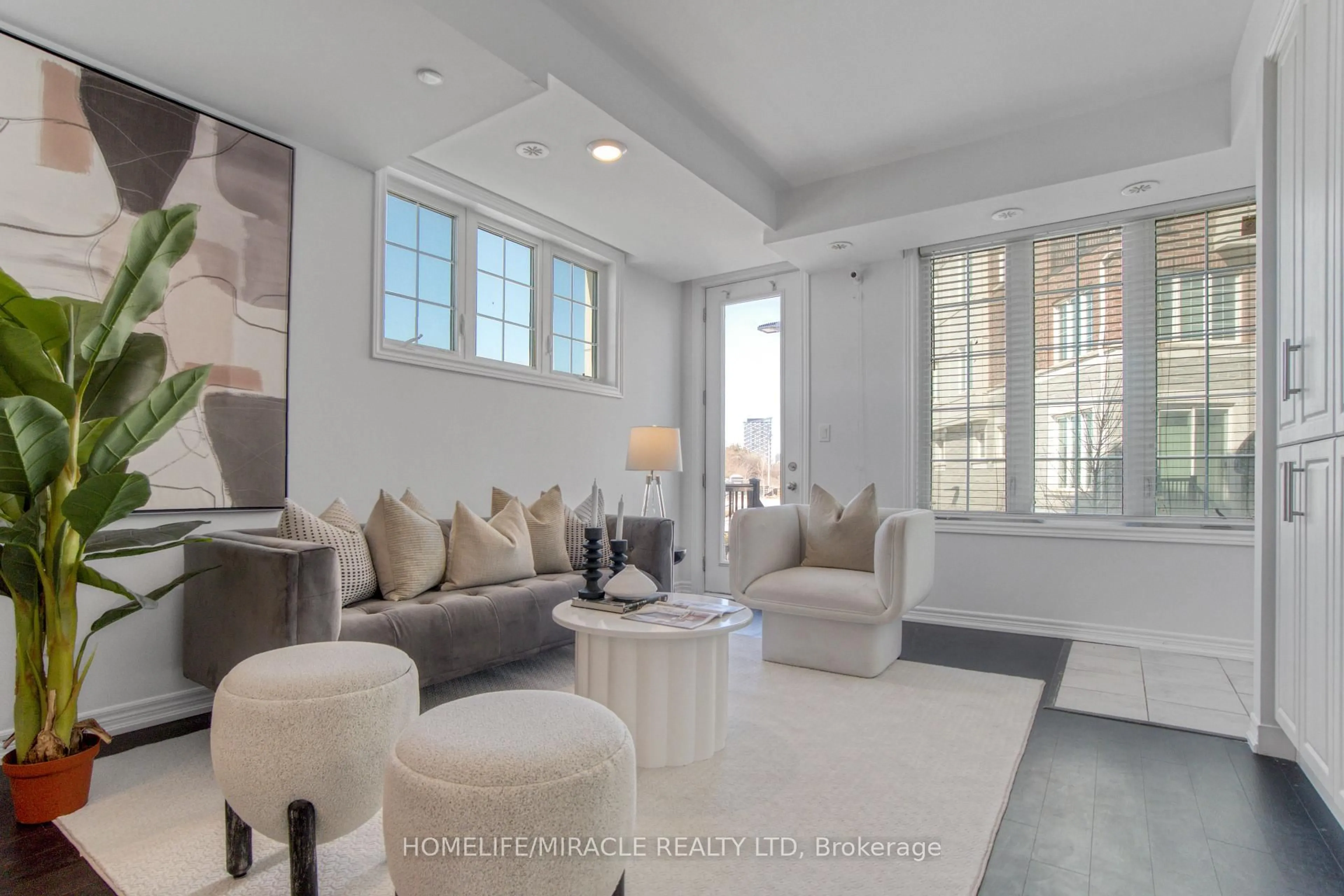 Living room with furniture, ceramic/tile floor for 2199 Lillykin St #17, Oakville Ontario L6H 0X6