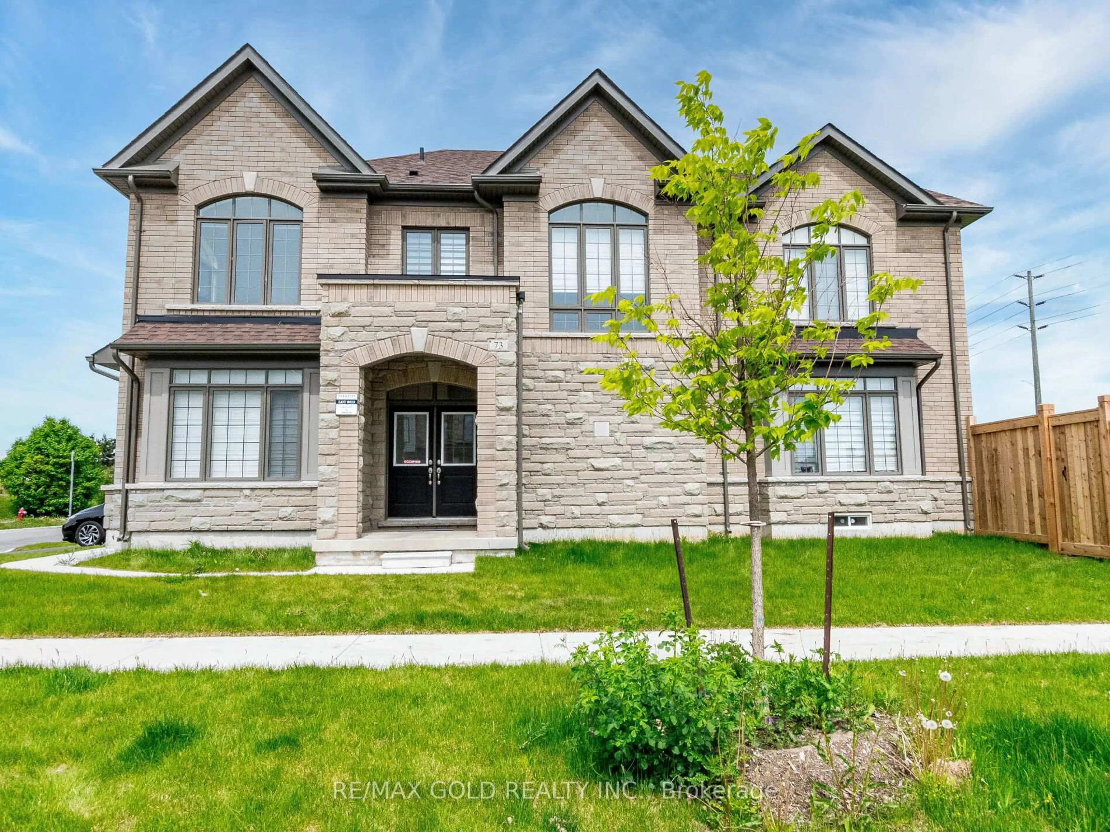 Home with brick exterior material, street for 73 Eastman Dr, Brampton Ontario L6X 5S5