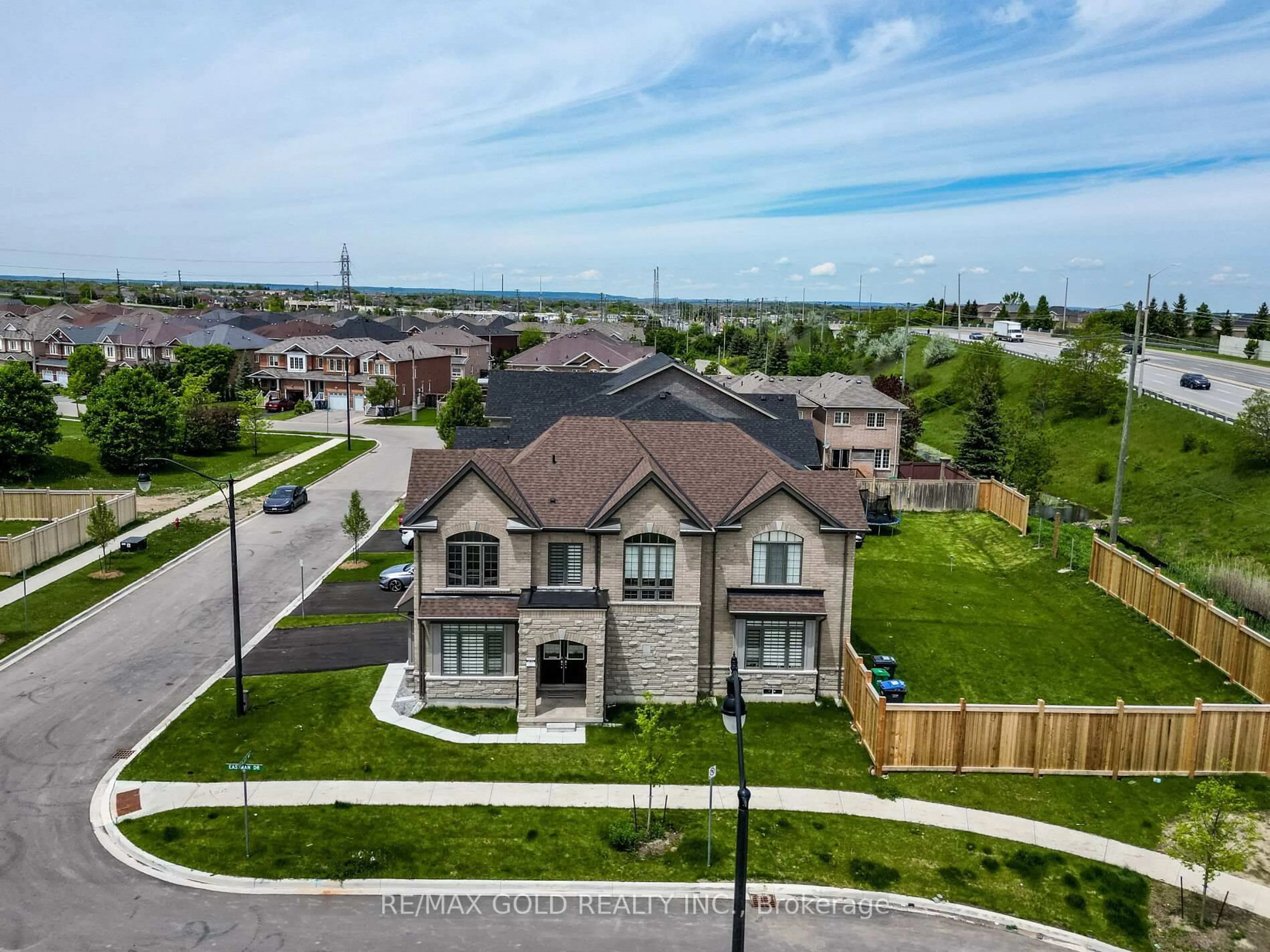 A pic from outside/outdoor area/front of a property/back of a property/a pic from drone, street for 73 Eastman Dr, Brampton Ontario L6X 5S5