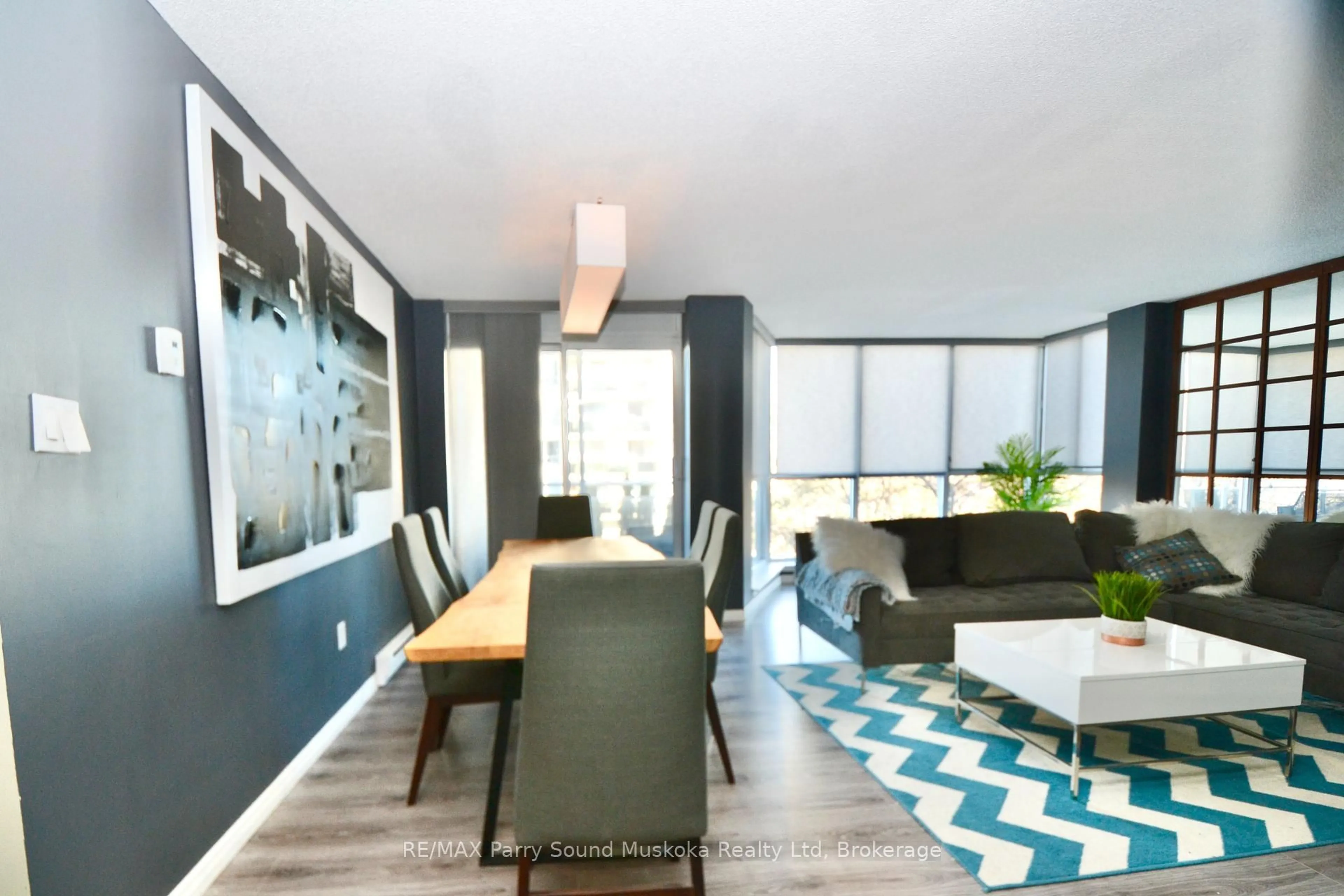Living room with furniture, unknown for 1071 Queens Ave #205, Oakville Ontario L6H 2R5