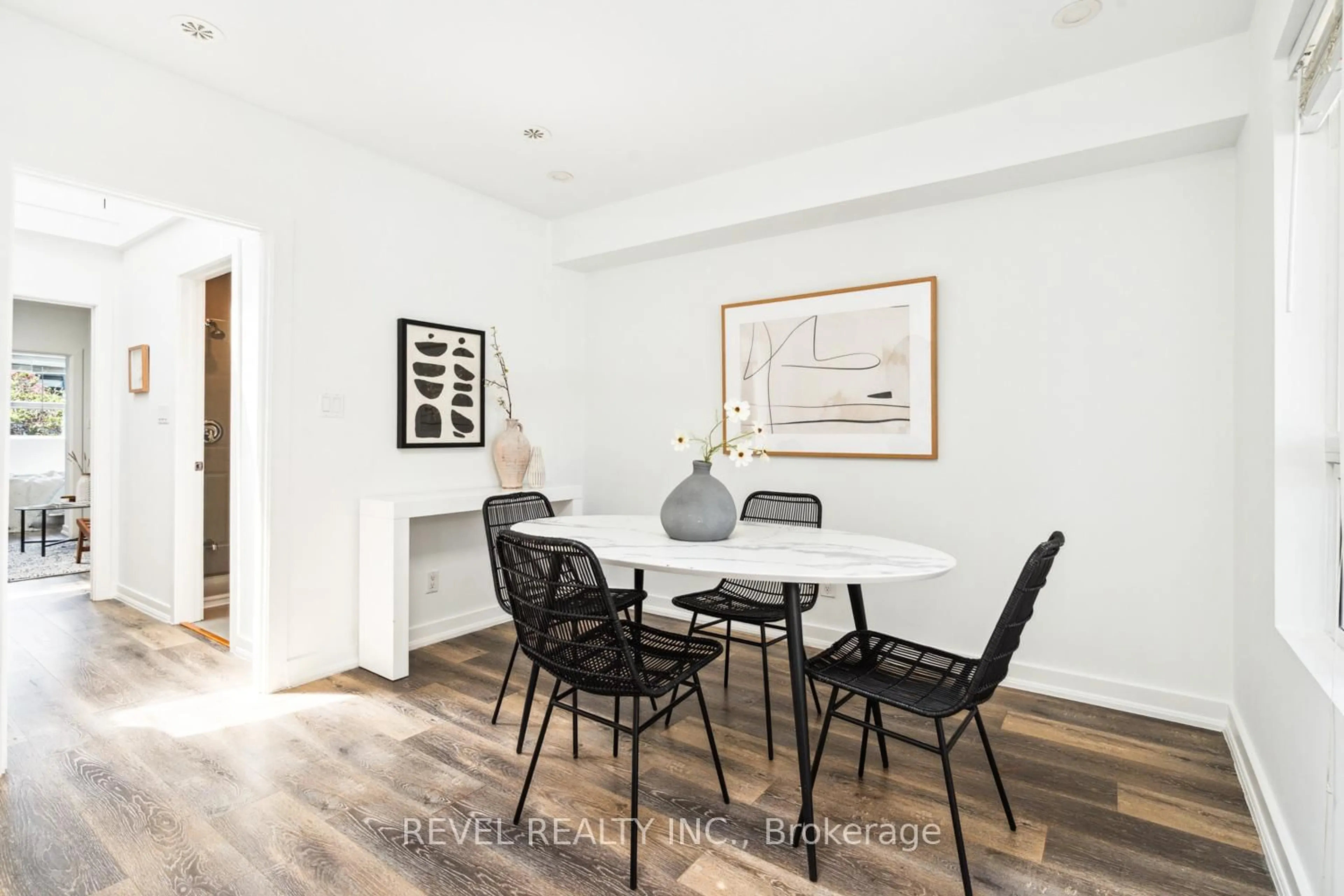 Dining room, wood/laminate floor for 526 Quebec Ave, Toronto Ontario M6P 2V7