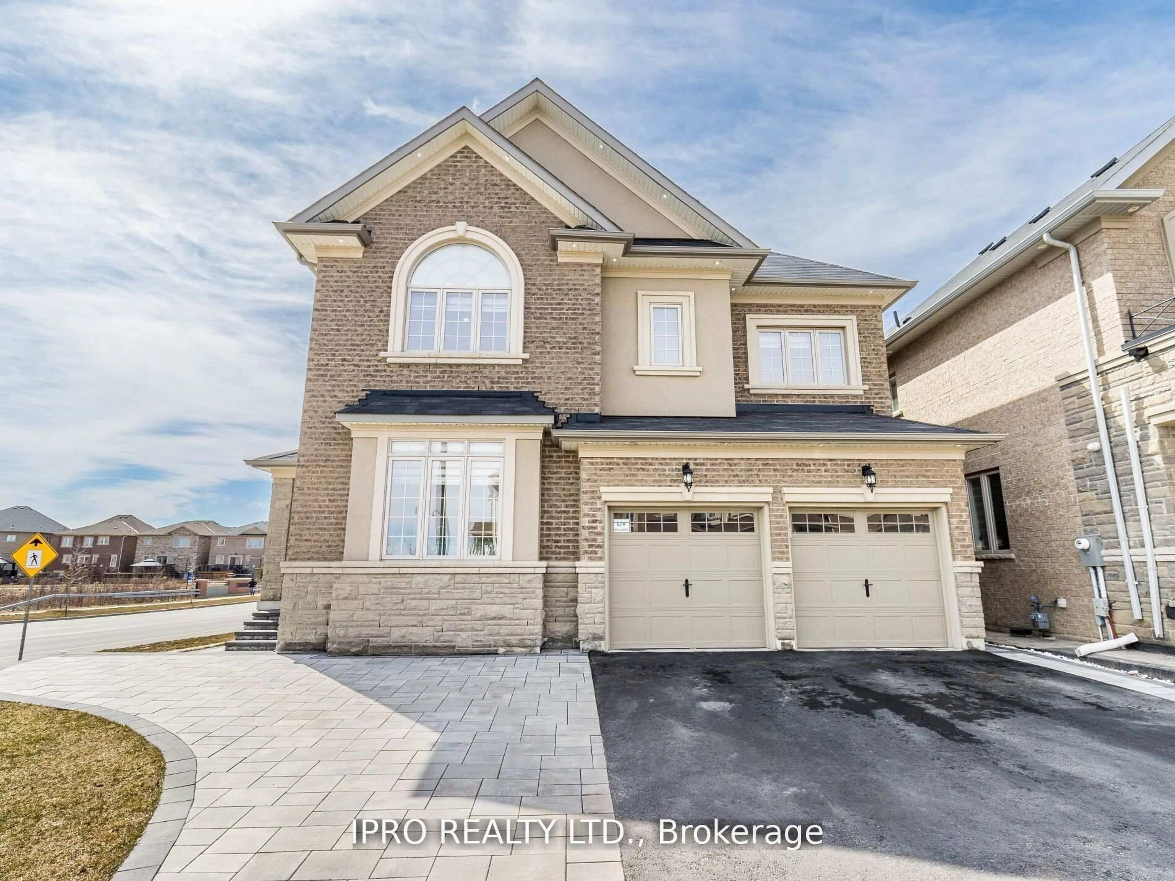 Home with brick exterior material, street for 360 Remembrance Rd, Brampton Ontario L7A 4X8