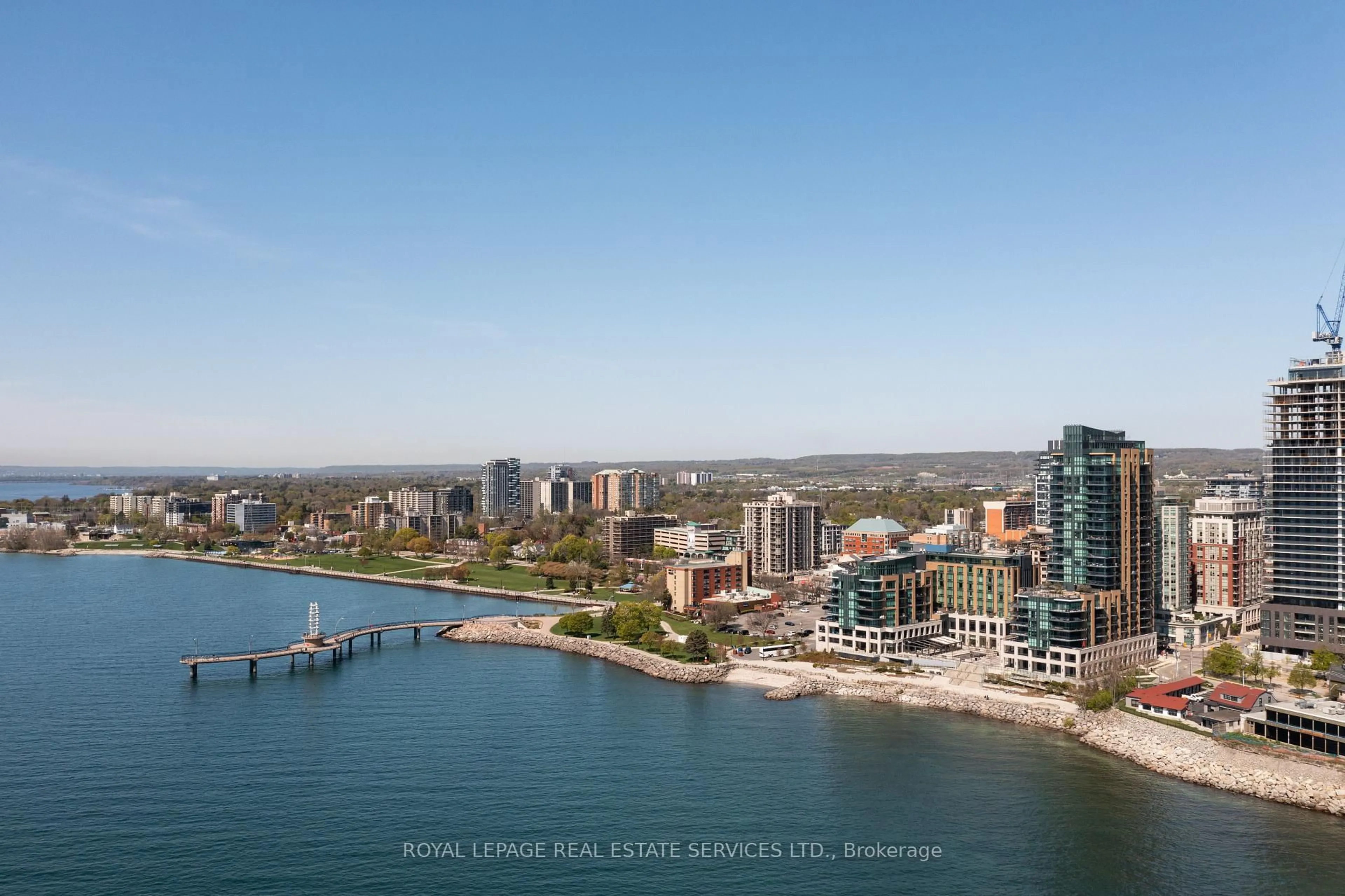 A pic from outside/outdoor area/front of a property/back of a property/a pic from drone, water/lake/river/ocean view for 2060 Lakeshore Rd #1201, Burlington Ontario L7R 0G2
