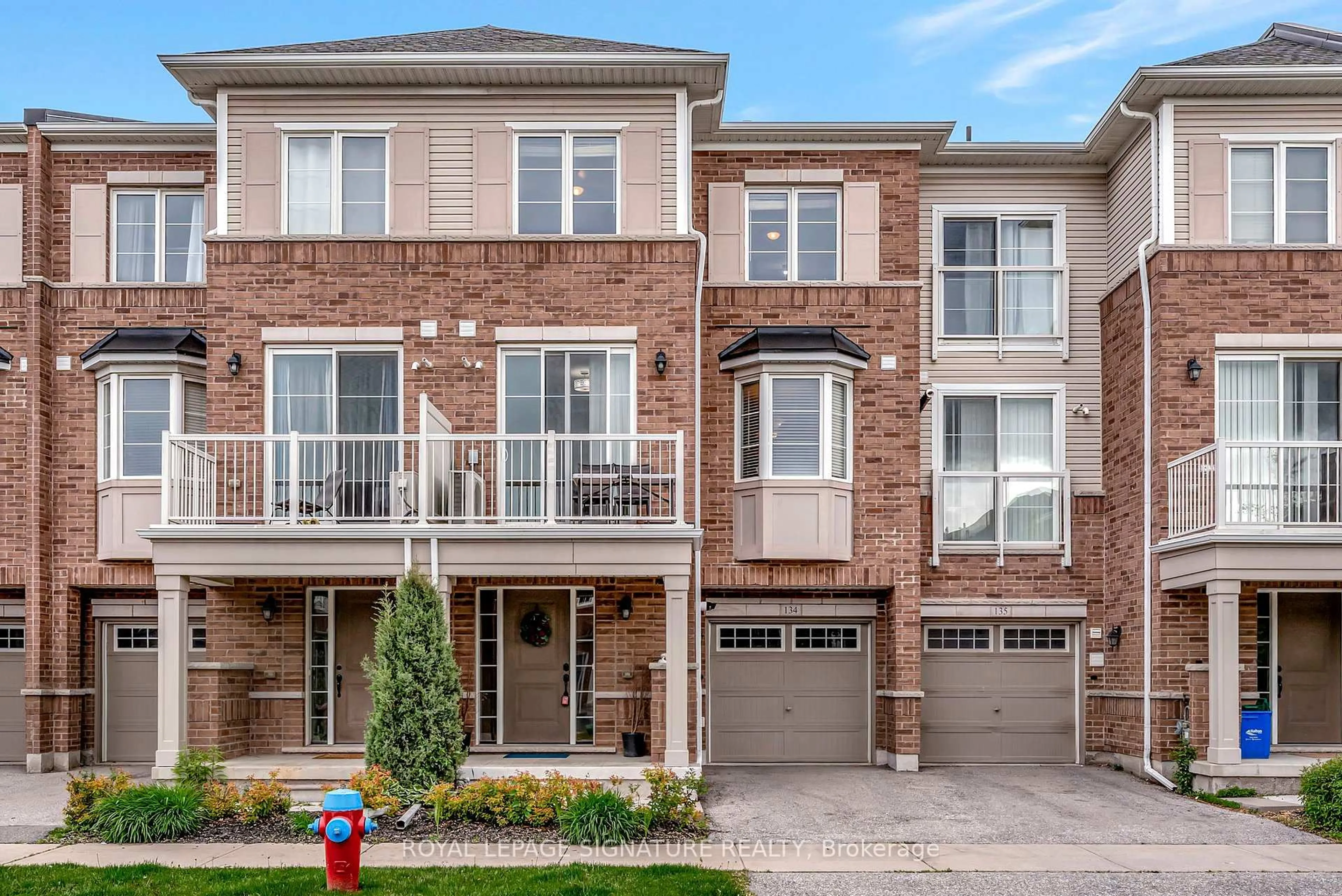 Home with brick exterior material, street for 165 Hampshire Way #134, Milton Ontario L9T 8M7