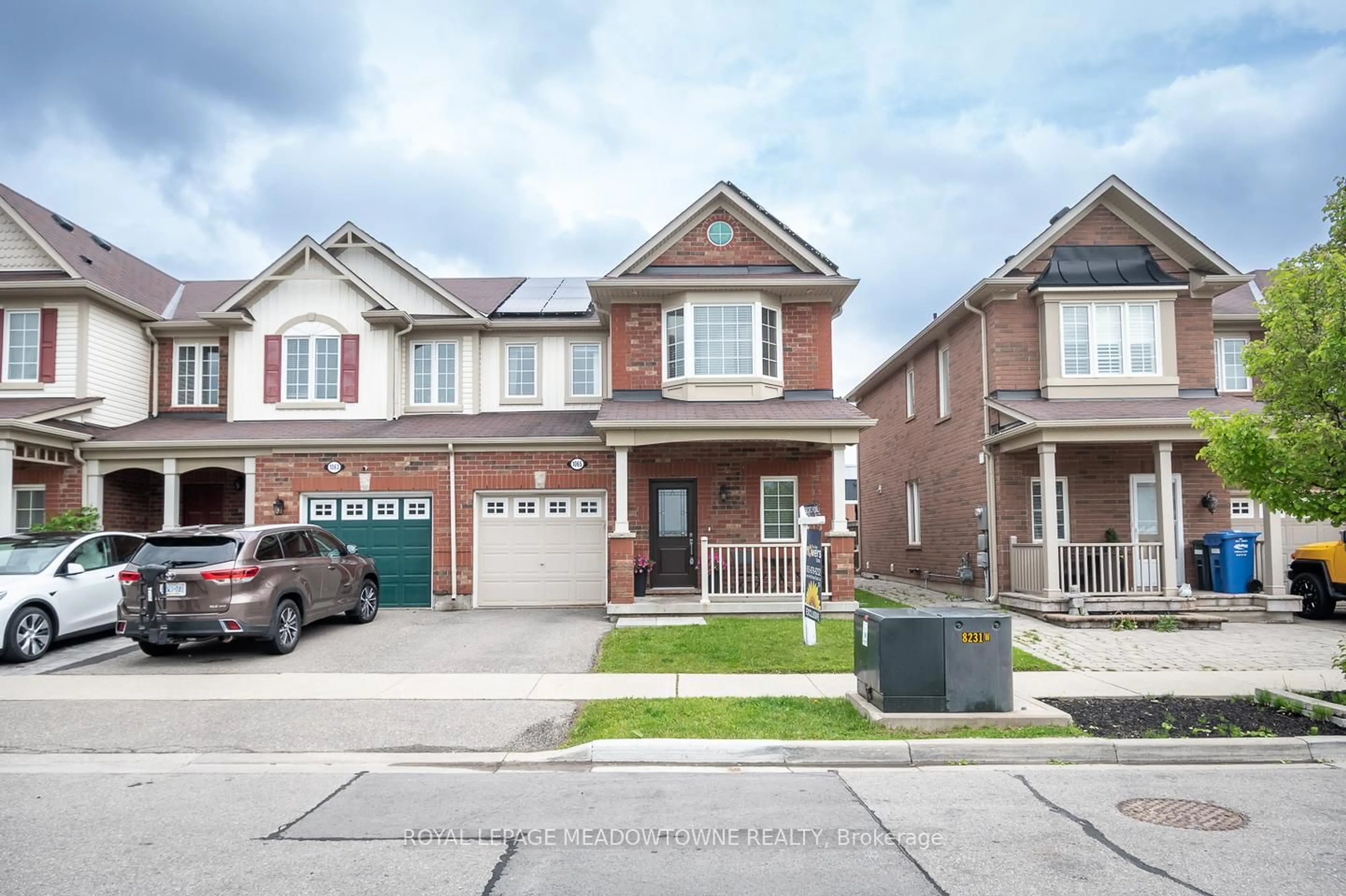 Home with brick exterior material, street for 1065 Nadalin Hts, Milton Ontario L9T 8H4