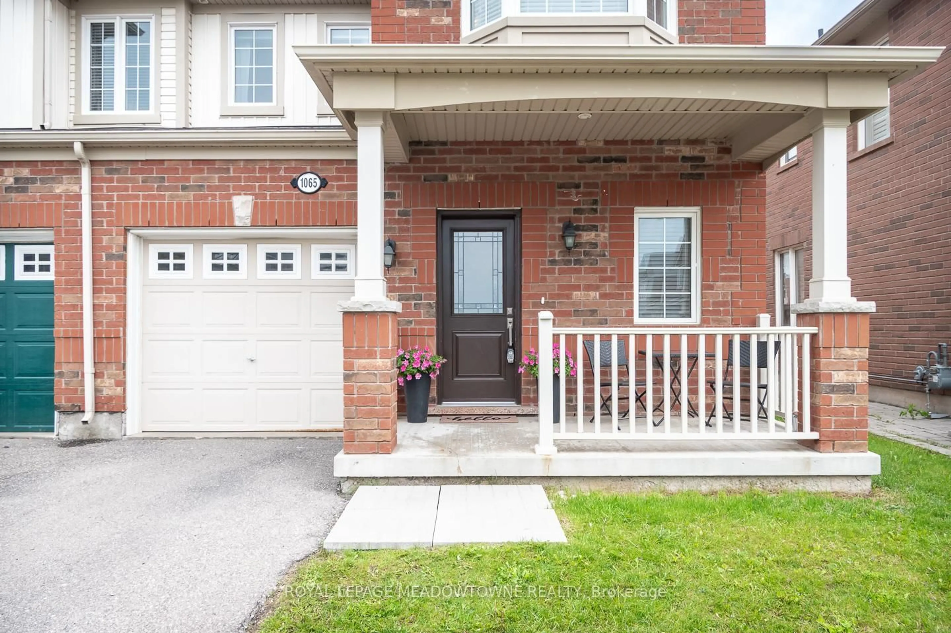 Home with brick exterior material, street for 1065 Nadalin Hts, Milton Ontario L9T 8H4