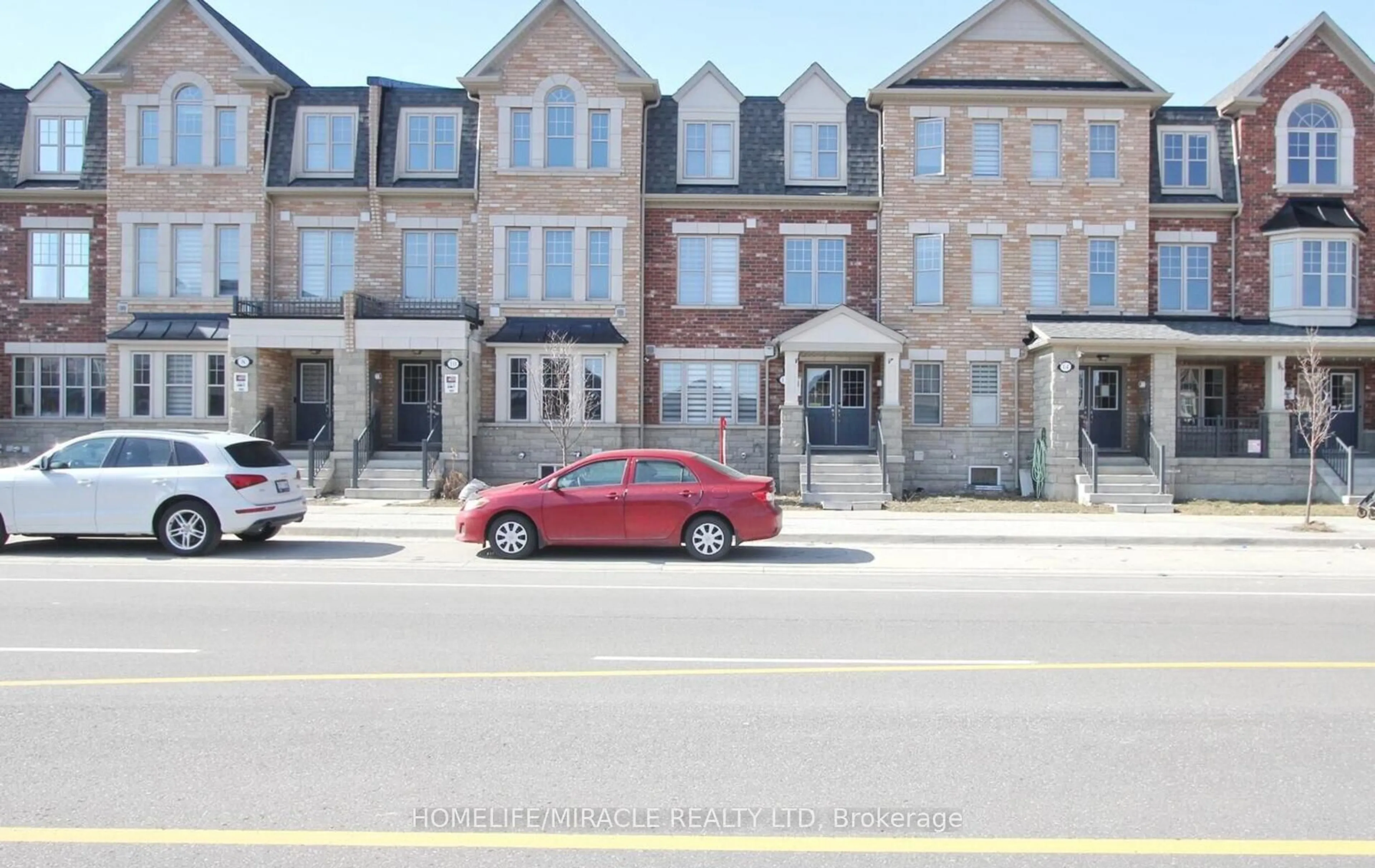 Home with brick exterior material, street for 12 Remembrance Rd, Brampton Ontario L7A 4Z1