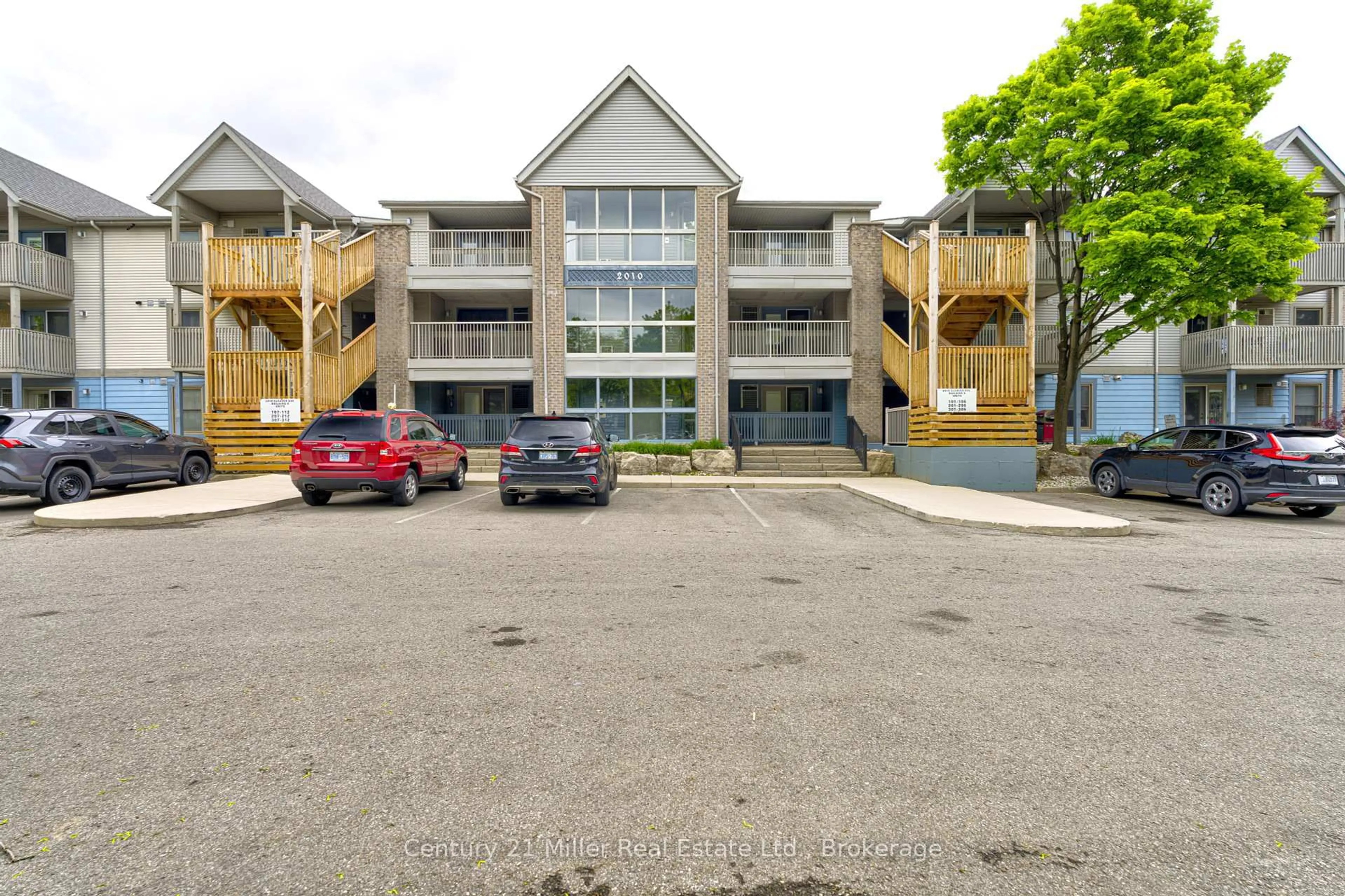 A pic from outside/outdoor area/front of a property/back of a property/a pic from drone, street for 2010 Cleaver Ave #205, Burlington Ontario L7M 4C1