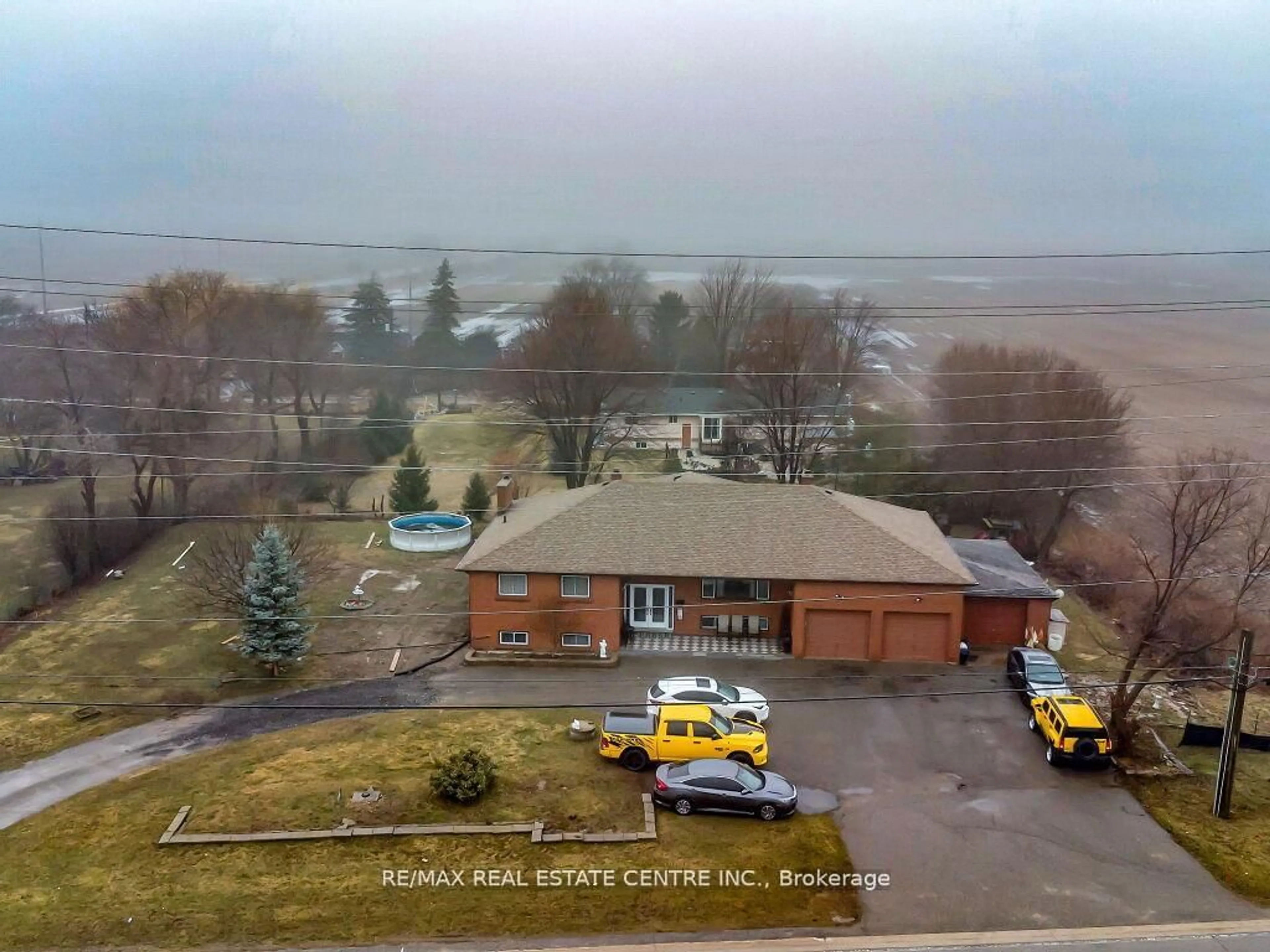 A pic from outside/outdoor area/front of a property/back of a property/a pic from drone, unknown for 13089 10th side Rd, Halton Hills Ontario L7G 4S5