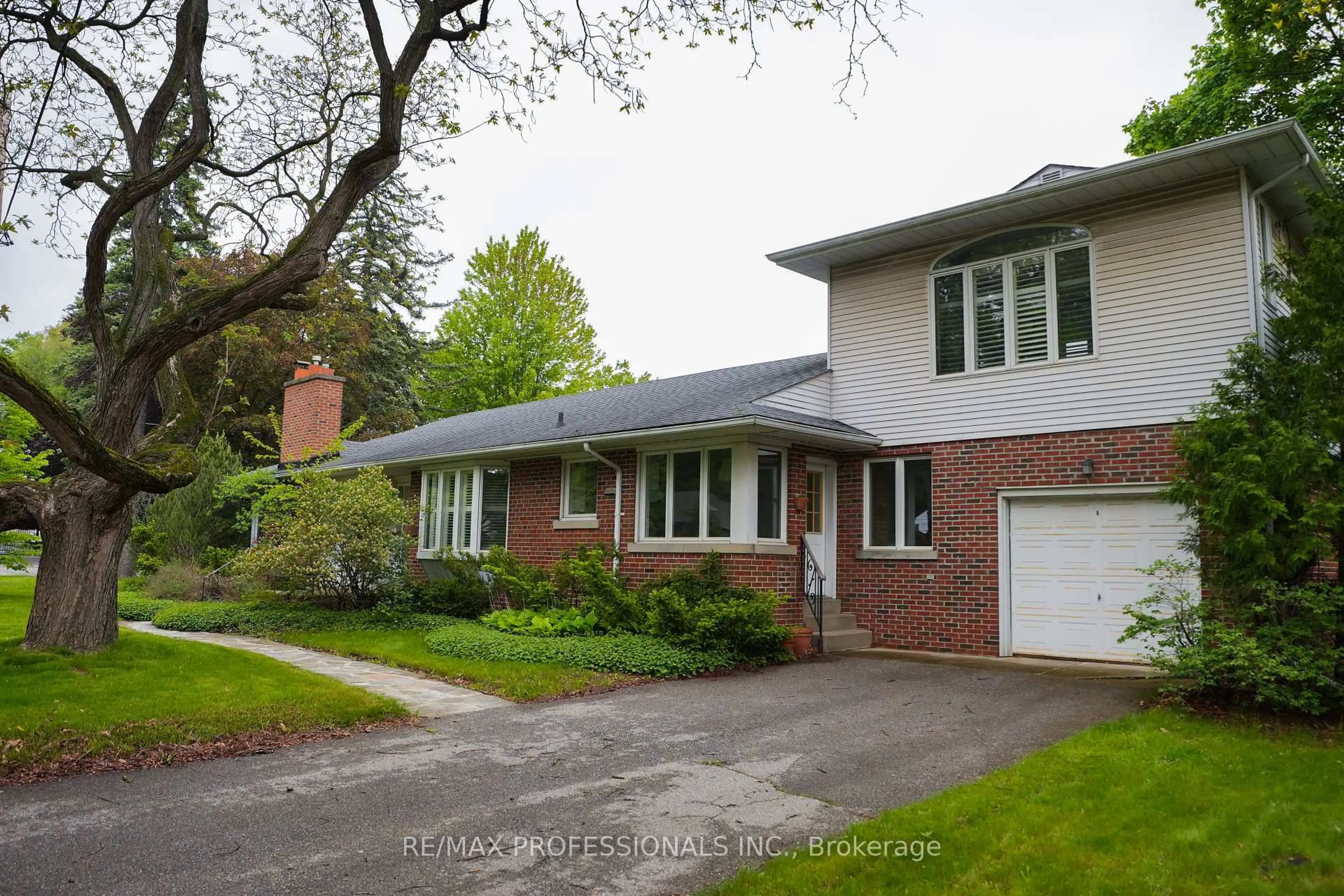 Home with brick exterior material, street for 88 Valecrest Dr, Toronto Ontario M9A 4P6