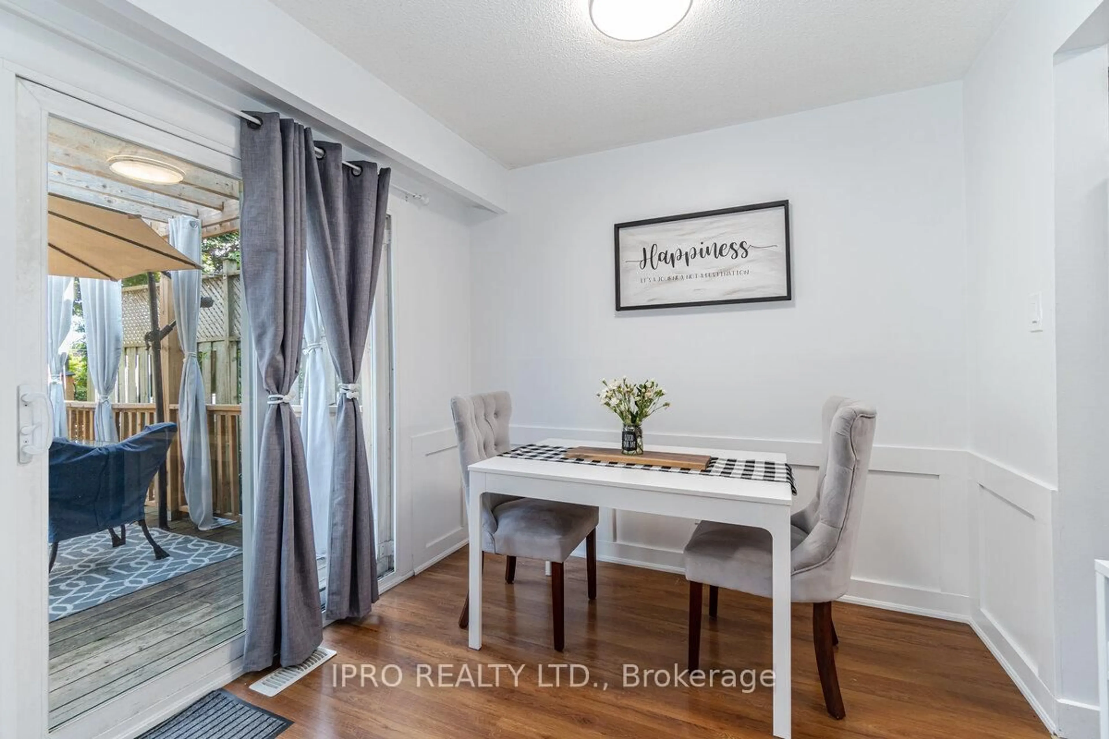 Dining room, wood/laminate floor for 258 Royal Salisbury Way, Brampton Ontario L6V 3H4