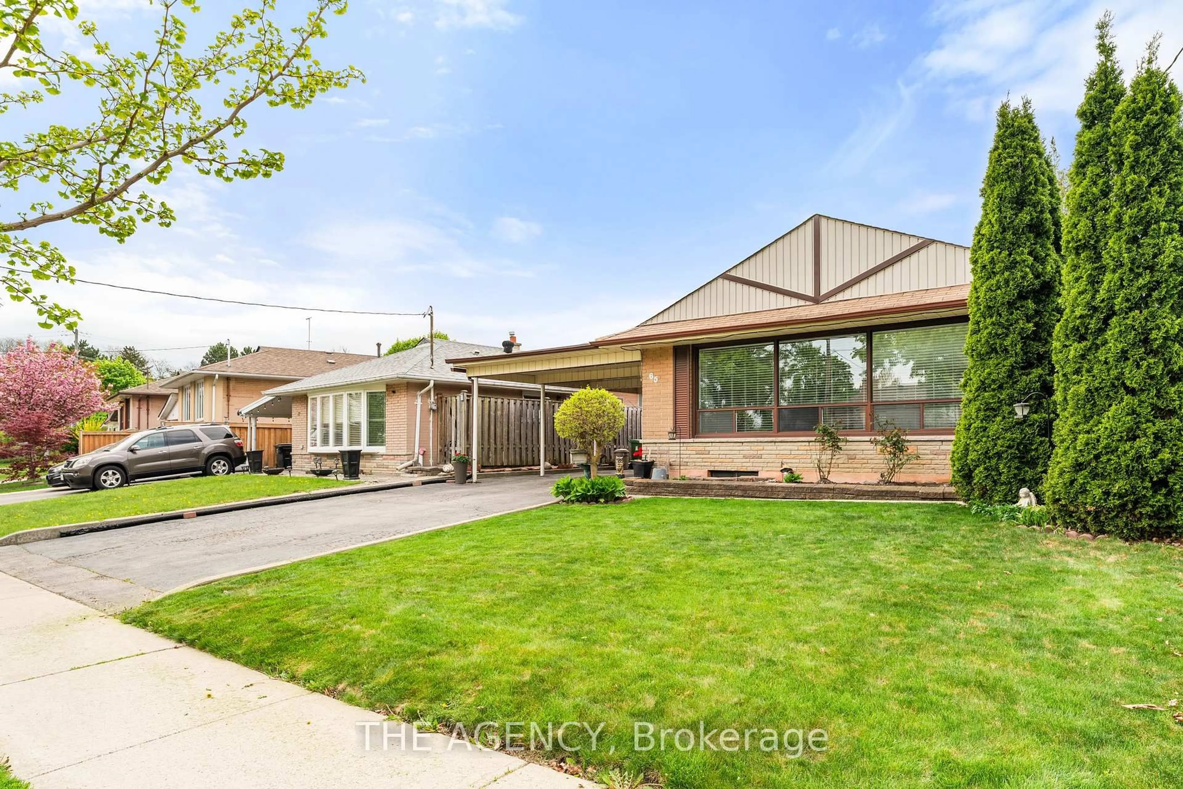 Home with brick exterior material, street for 65 Barkwin Dr, Toronto Ontario M9V 2W5