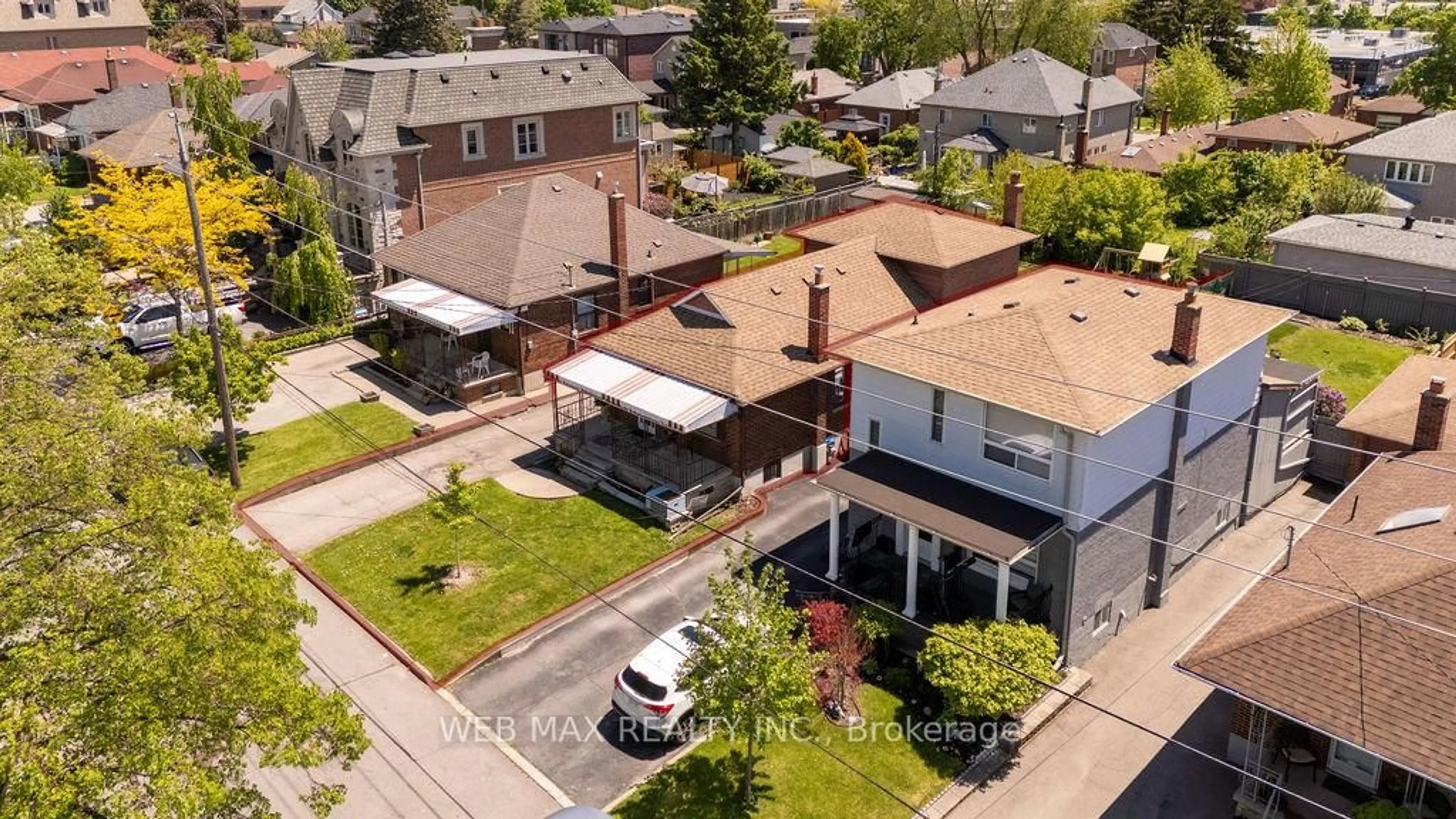 A pic from outside/outdoor area/front of a property/back of a property/a pic from drone, street for 565 Glen Park Ave, Toronto Ontario M6B 2G4