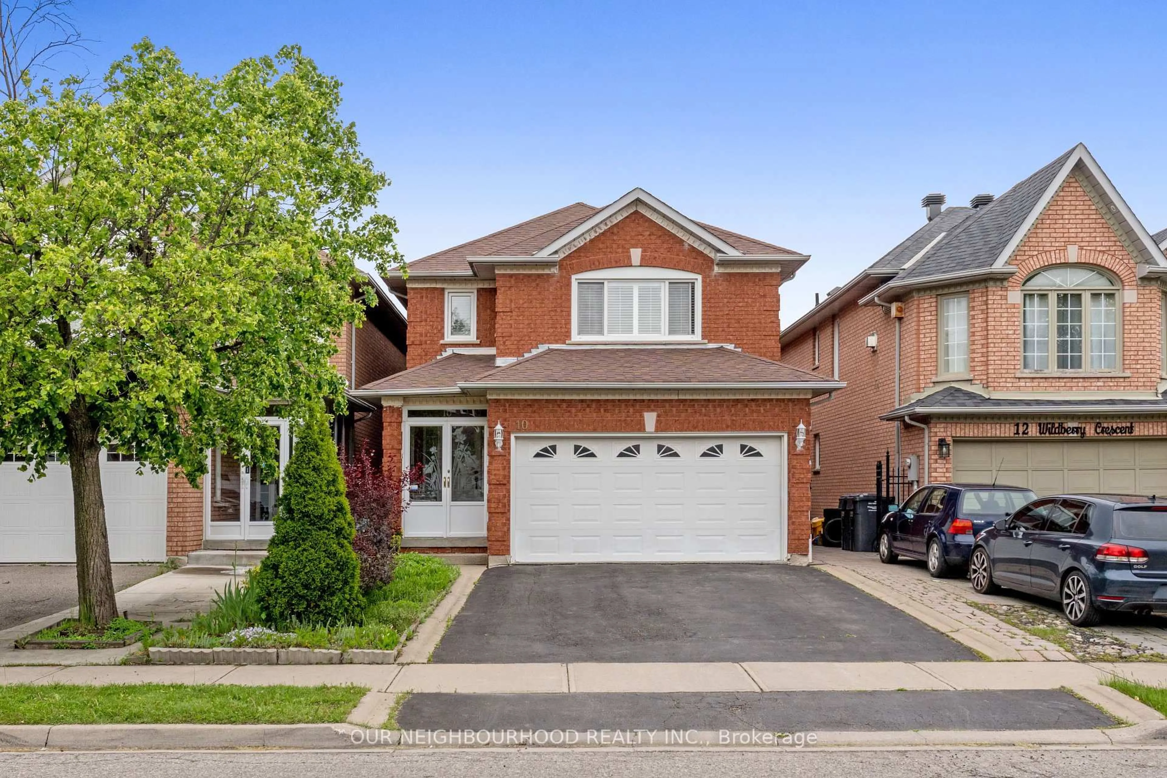 Home with brick exterior material, street for 10 Wildberry Cres, Brampton Ontario L6R 1M7