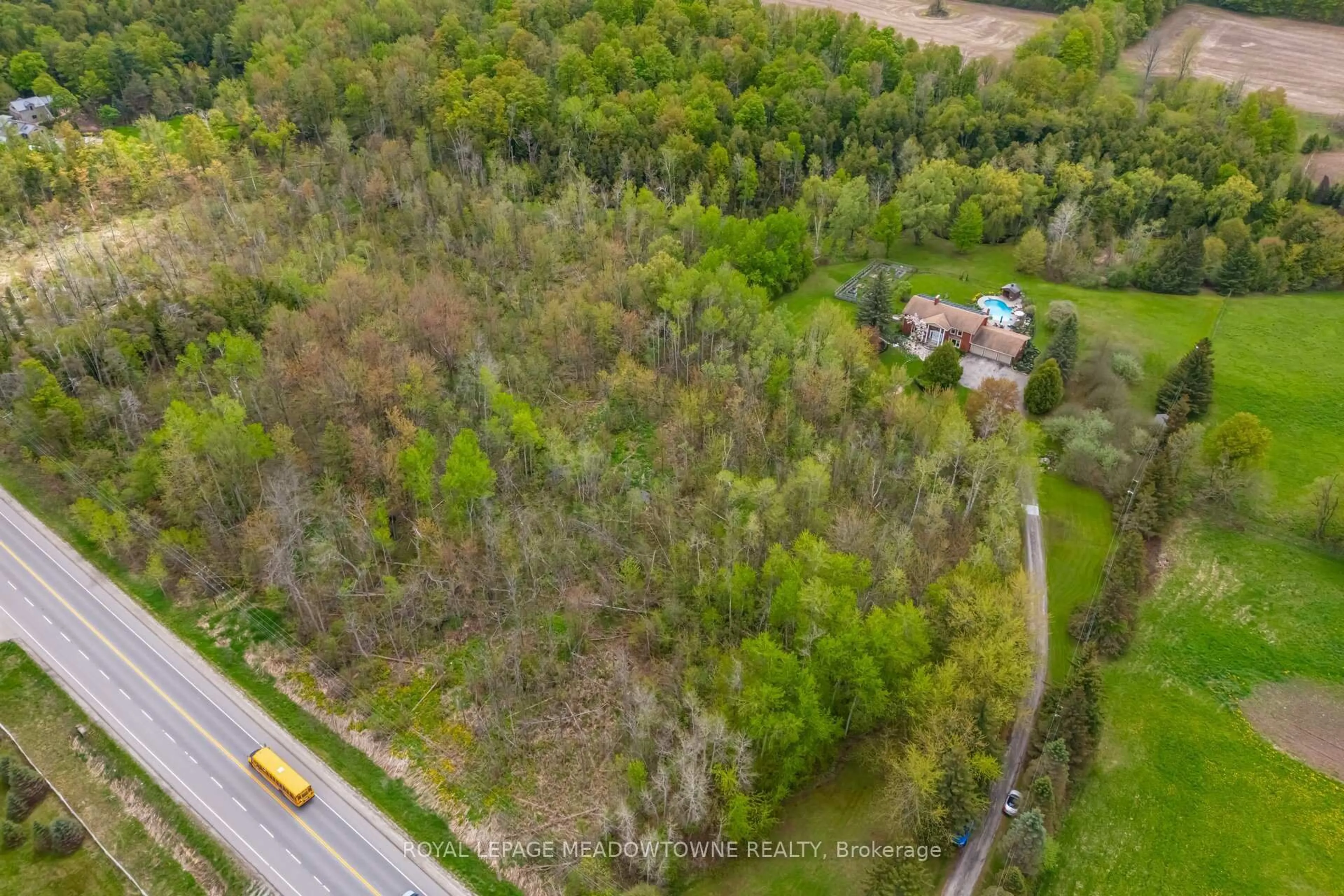 A pic from outside/outdoor area/front of a property/back of a property/a pic from drone, forest/trees view for 11302 Regional 25 Rd, Halton Hills Ontario L7J 2M1