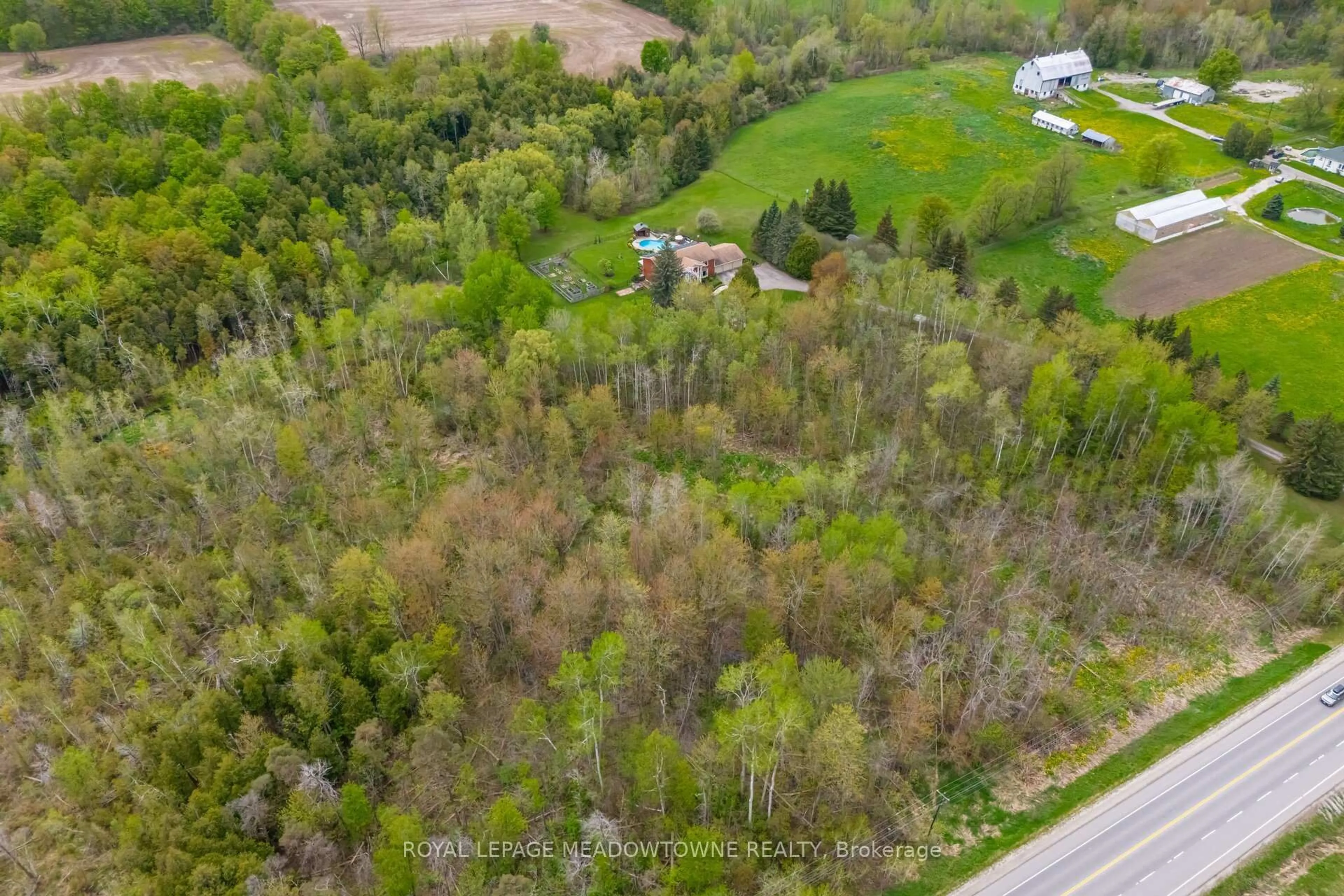 A pic from outside/outdoor area/front of a property/back of a property/a pic from drone, forest/trees view for 11302 Regional 25 Rd, Halton Hills Ontario L7J 2M1