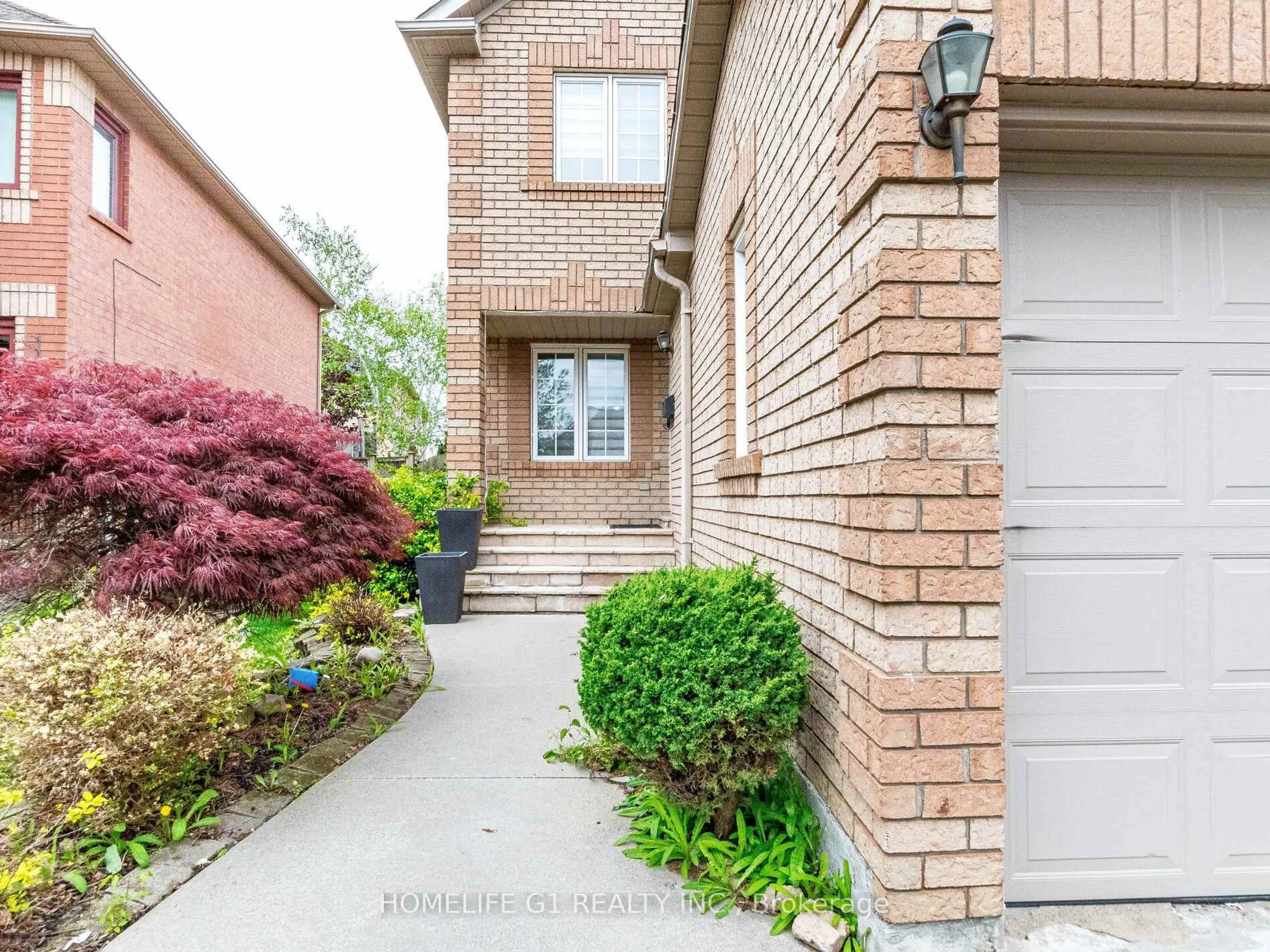 Home with brick exterior material, street for 32 Creekwood Dr, Brampton Ontario L7A 1J3